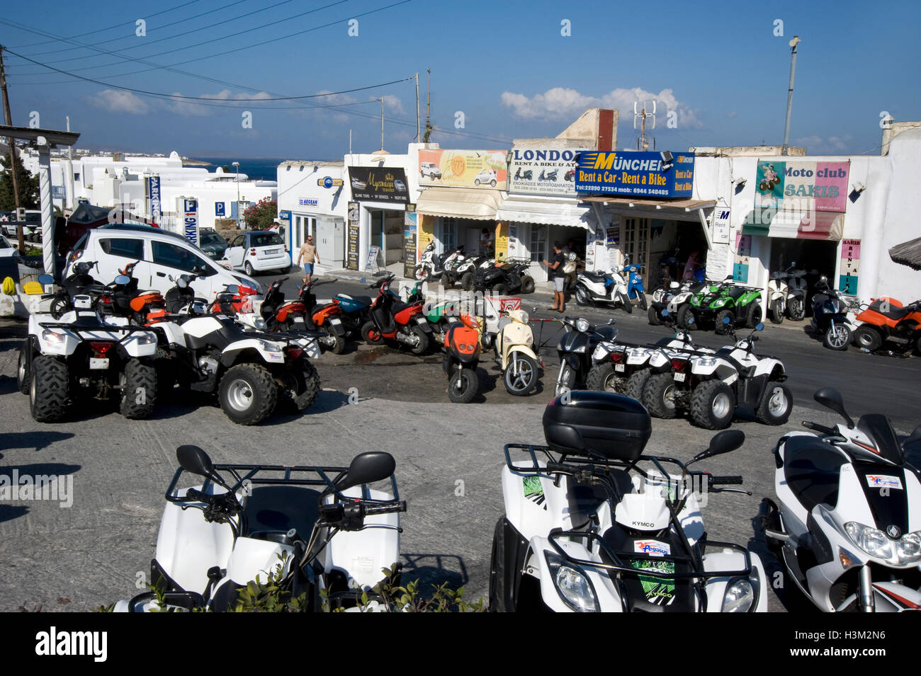 Rental vehicles outside shops in the town of Mykonos, Greece Stock Photo -  Alamy