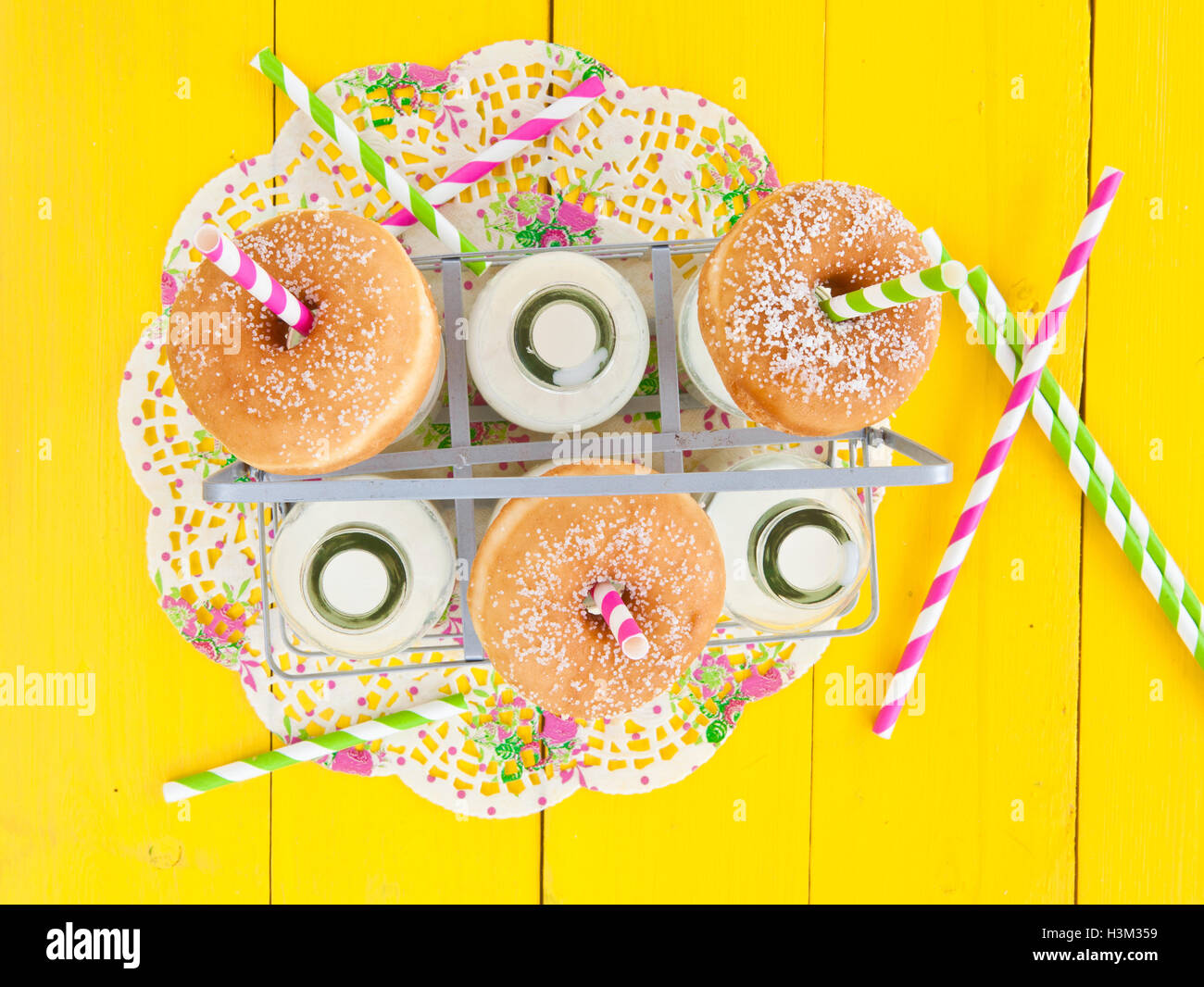 Milk and donuts Stock Photo Alamy