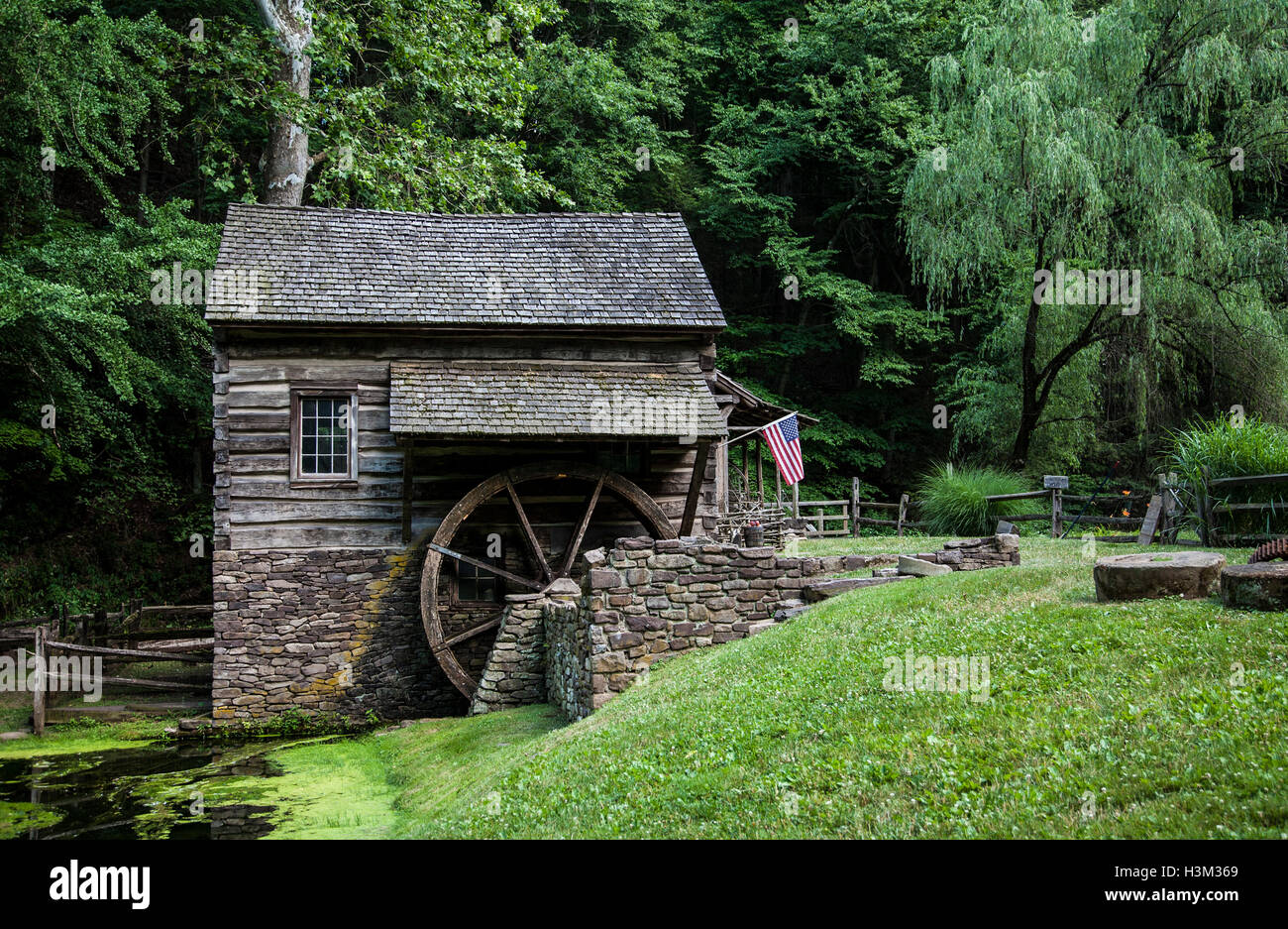 Historic Cuttalossa farm and gristmill cabin in the woods, Bucks County, Pennsylvania, PA  USA, old country farm historic house, historical images Stock Photo