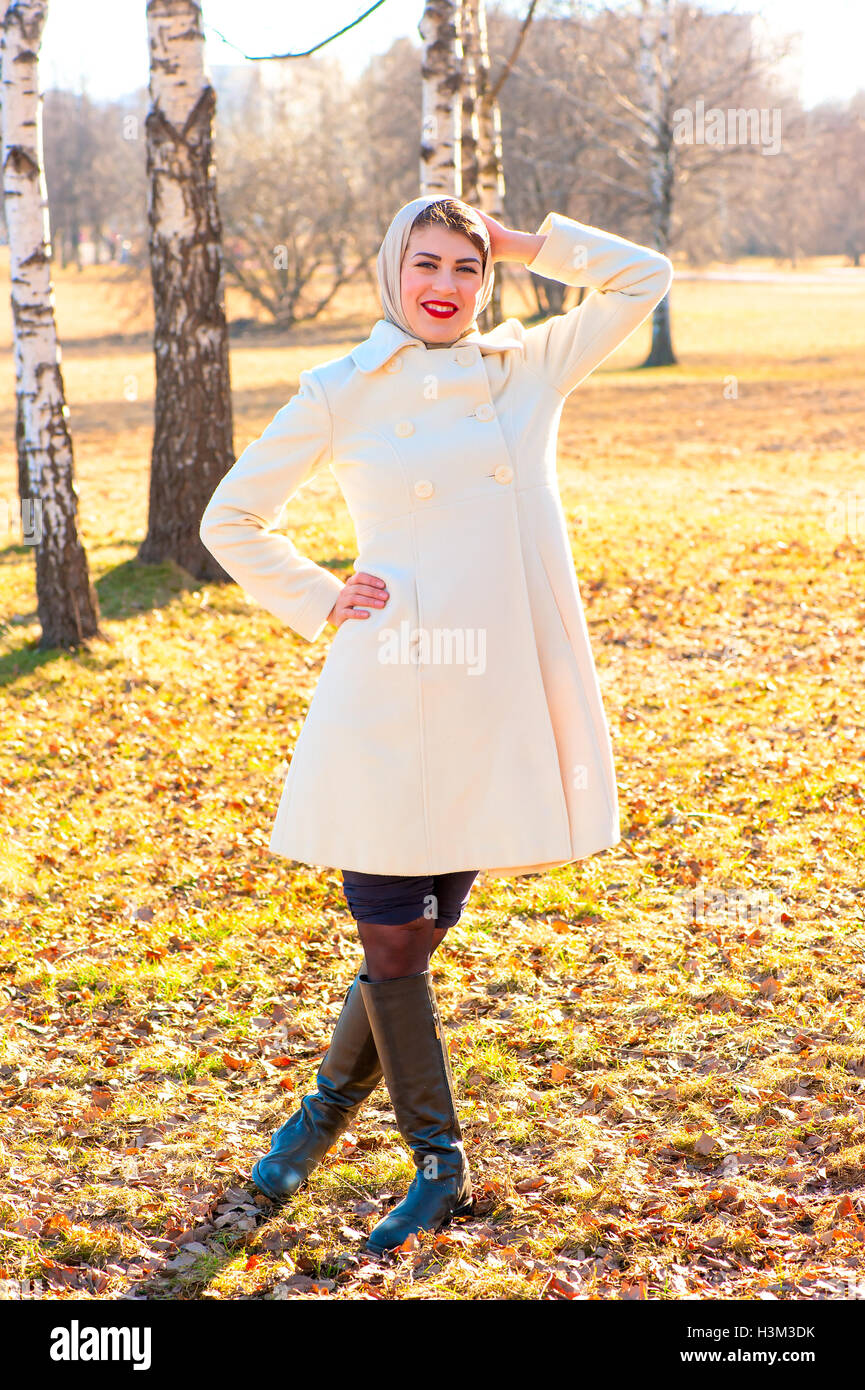 happy girl walking in autumn park Stock Photo - Alamy