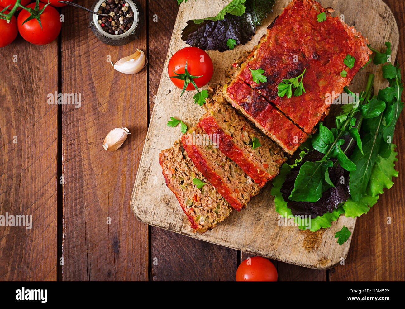 Homemade ground meatloaf with vegetables. Top view Stock Photo - Alamy