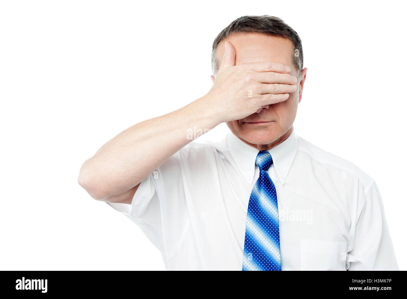 Attractive male cover eyes with his hands Stock Photo Alamy