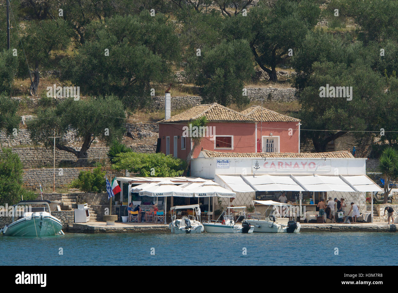 Waterside restaurant Mongonissi Paxos Ionian Islands Greece Stock Photo