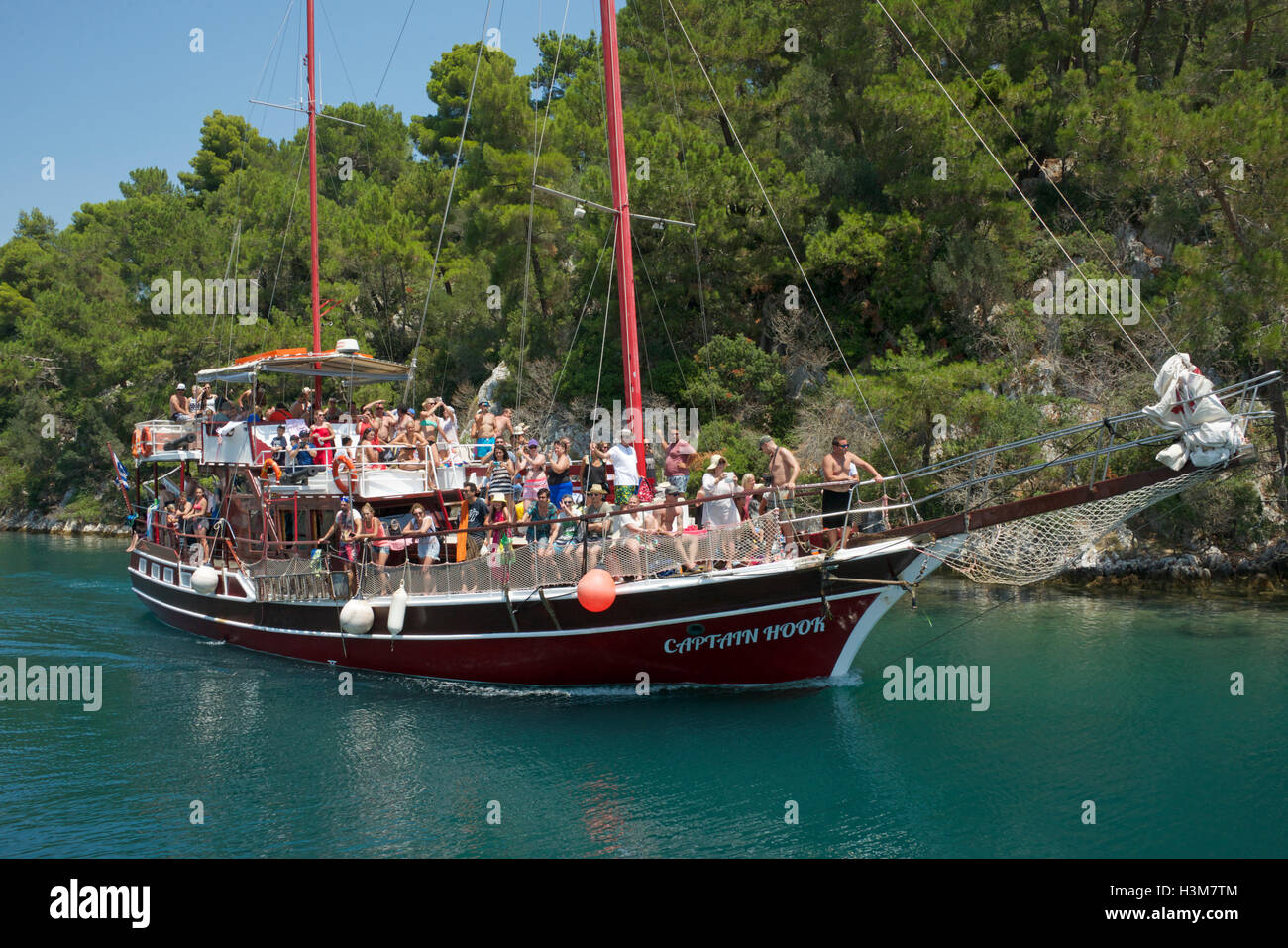 Captain Hook an overcrowded tourist boat Gaios port Paxos Ionian Islands Greece Stock Photo