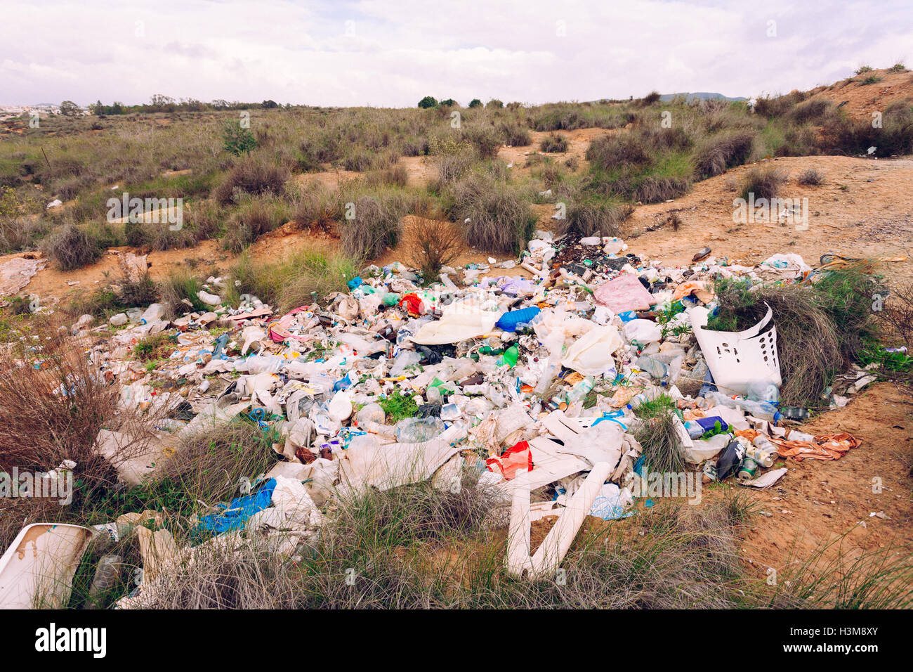 Illegal garbage disposal pollutes environment Stock Photo - Alamy