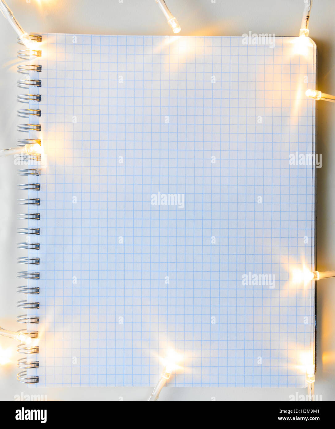 Christmas lights on gray table Stock Photo Alamy