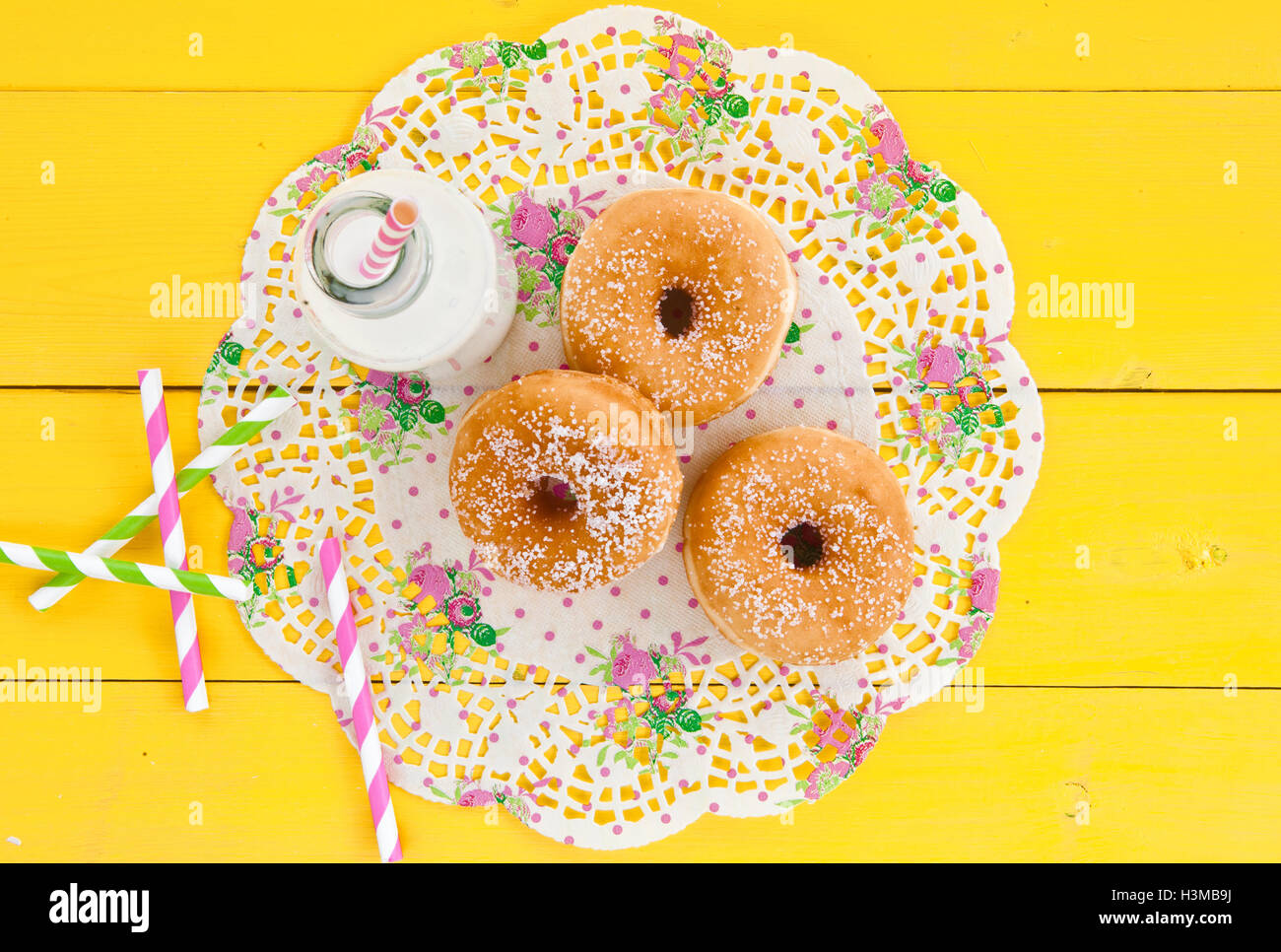 Milk and donuts Stock Photo Alamy