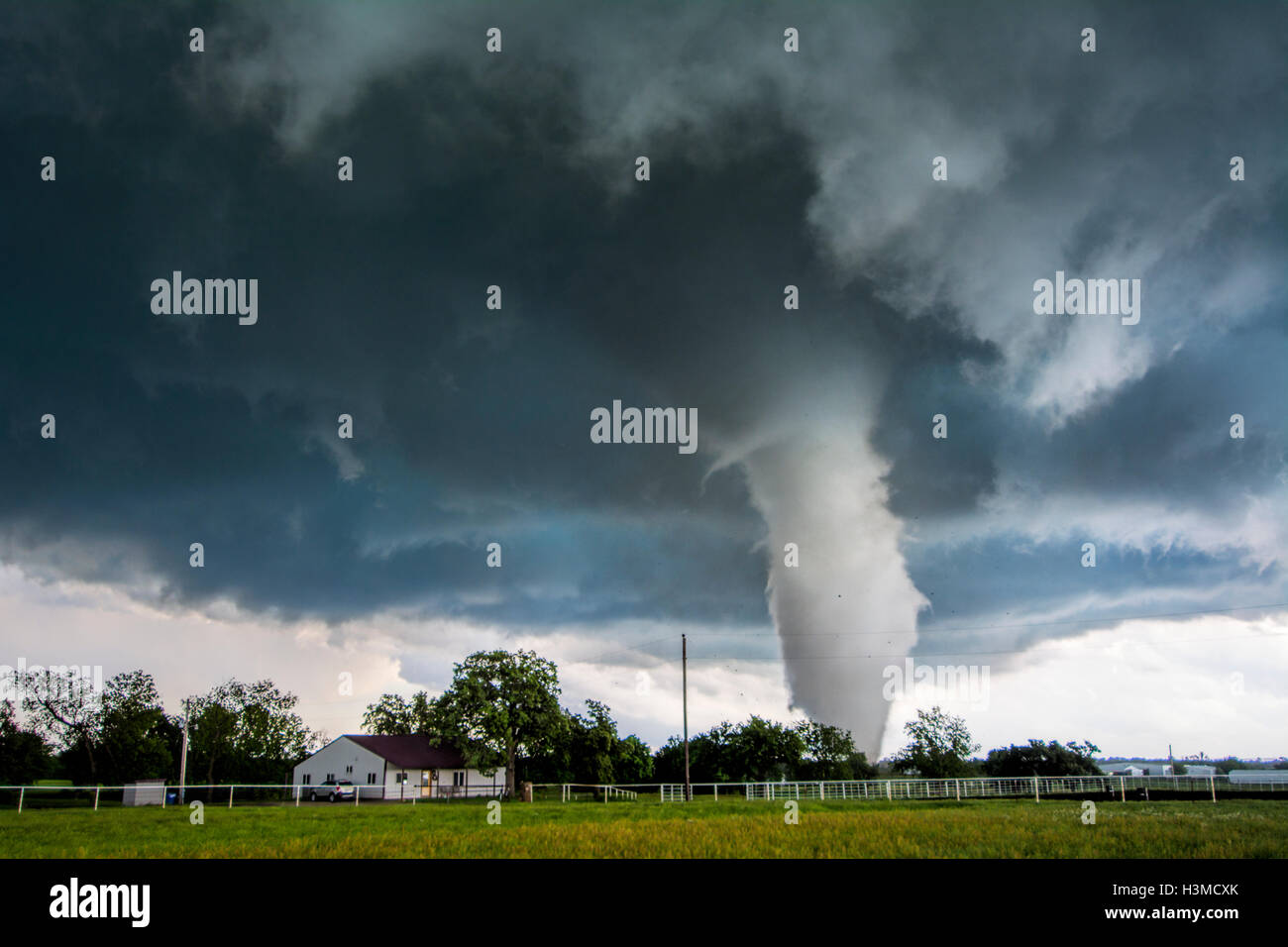 A tornado rated EF4 - with winds 166 to 175 miles per hour - striking a neighbourhood in Katie, Oklahoma Stock Photo