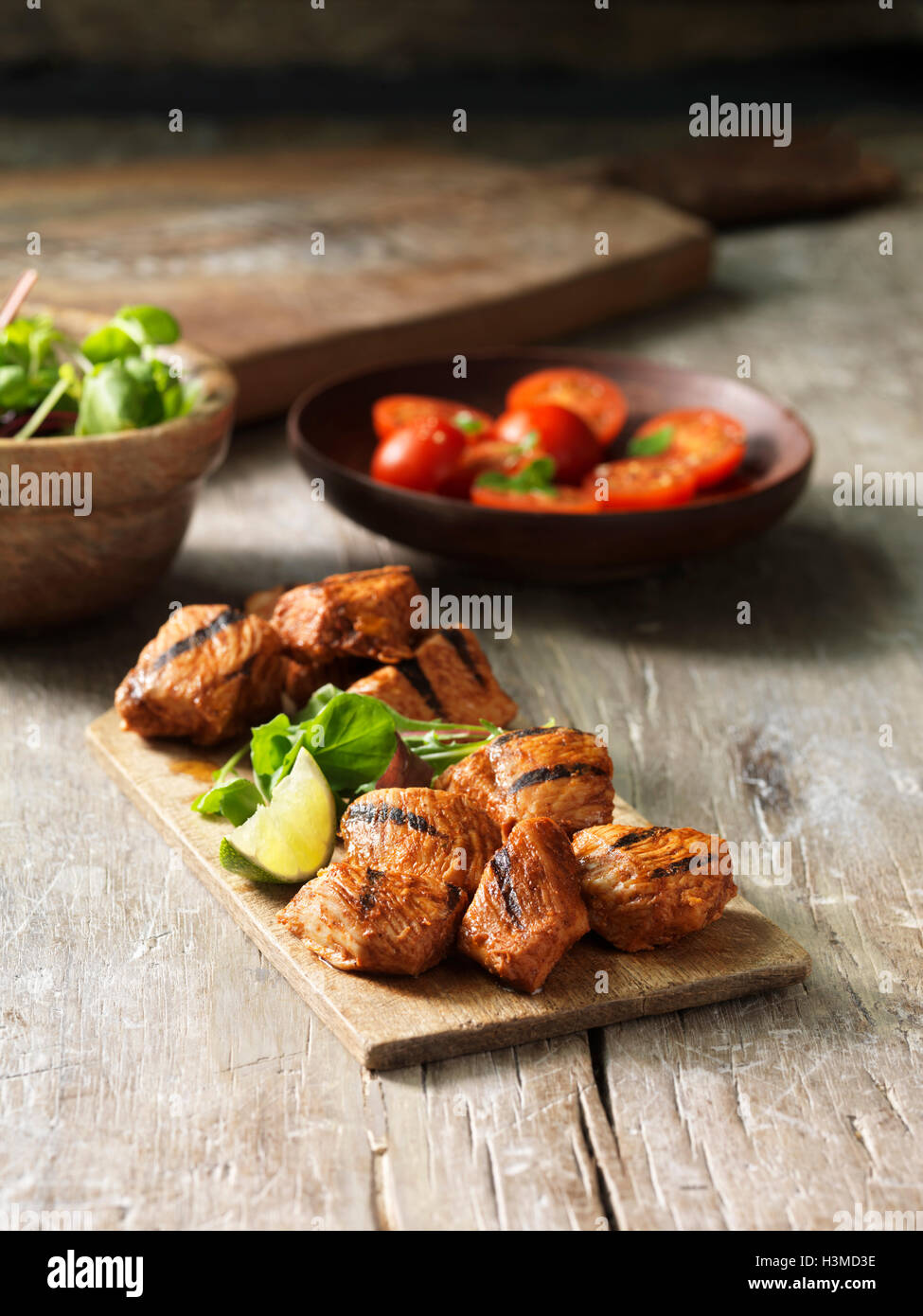 Hickory smoked bbq chicken, cherry tomatoes, fresh lime slice, green