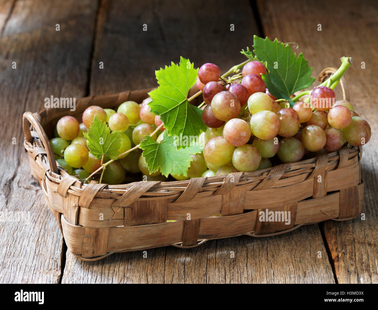 Fresh organic fruit, mango grapes Stock Photo Alamy