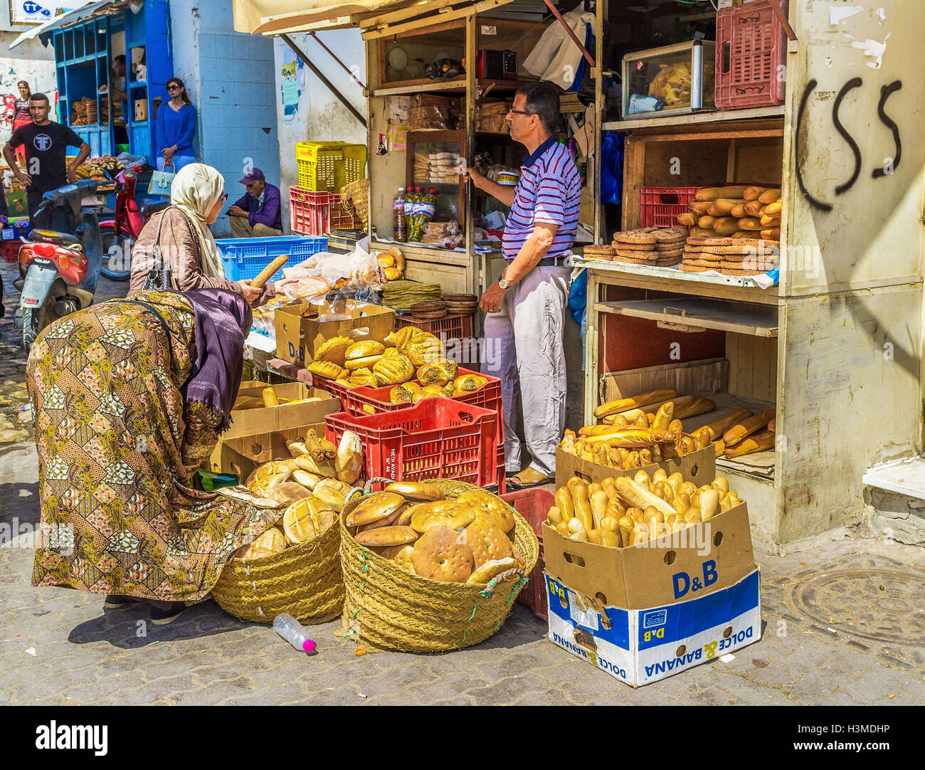 The locals chose the freshest bread in a market stall in Sfax. Stock Photo
