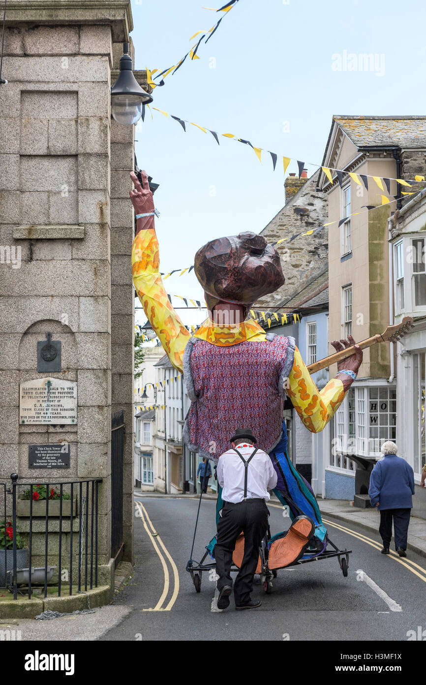 An effigy is wheeled to the start of the Penryn Festival in Cornwall Stock Photo