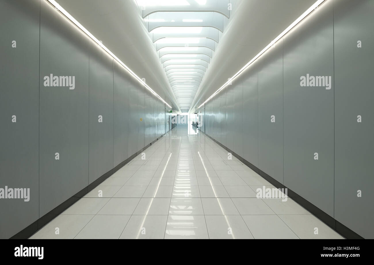 looking along long interior corridor in commercial building, london, england Stock Photo