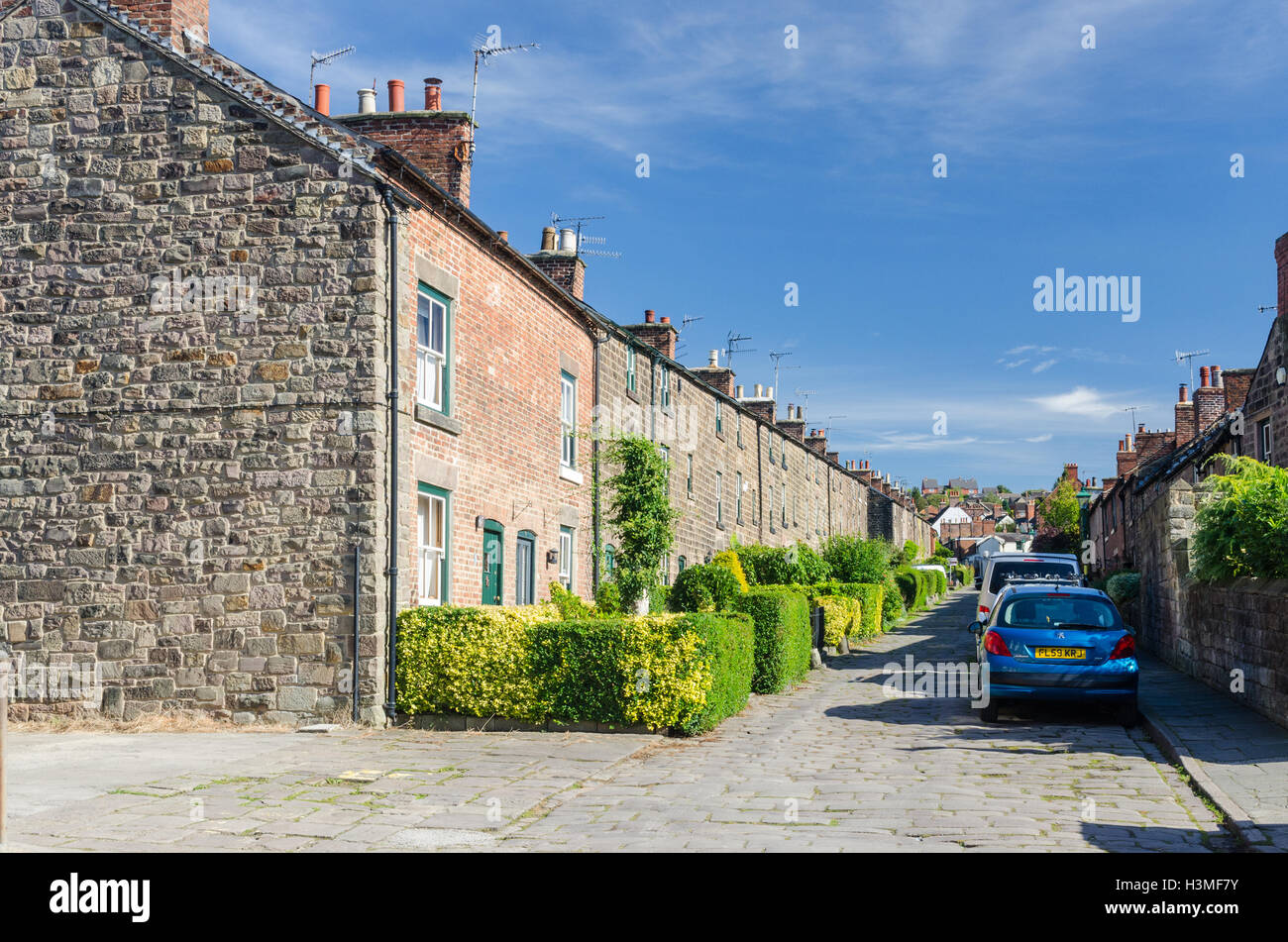 Stone houses in Long Row, Belper which were built by the Strutt family
