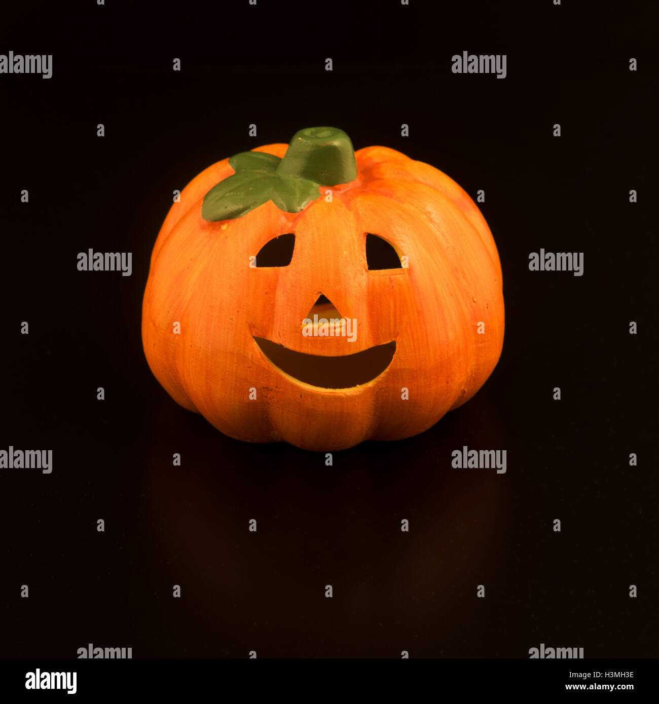 Halloween pumpkin with candlelight and boke background Stock Photo