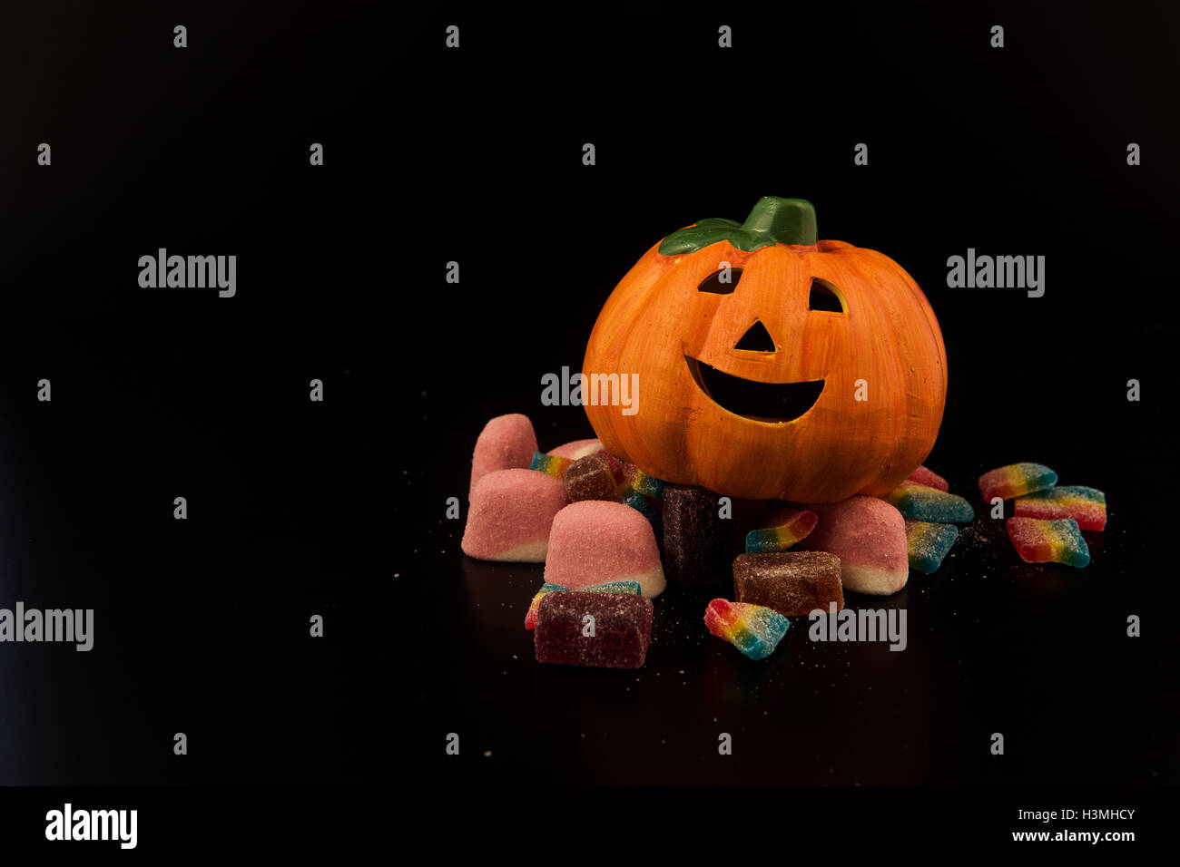 Halloween pumpkin with candlelight and boke background Stock Photo