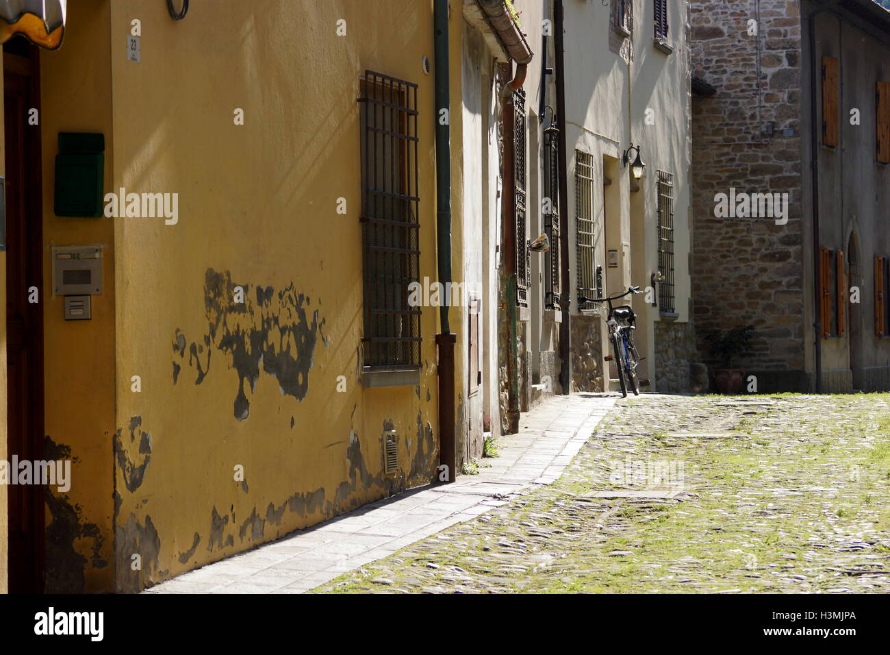 The quiet provincial street in Italy on a warm summer day. Emilia-Romagna, Forlì-Cesena, Italy Stock Photo