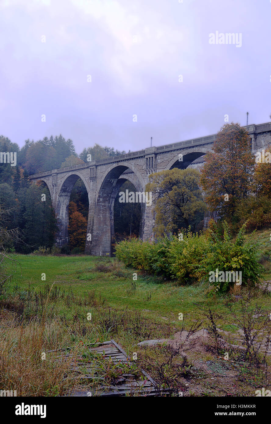 Two five-arched railway viaducts at Stanczyki, Poland, on a misty autumn day. Stock Photo