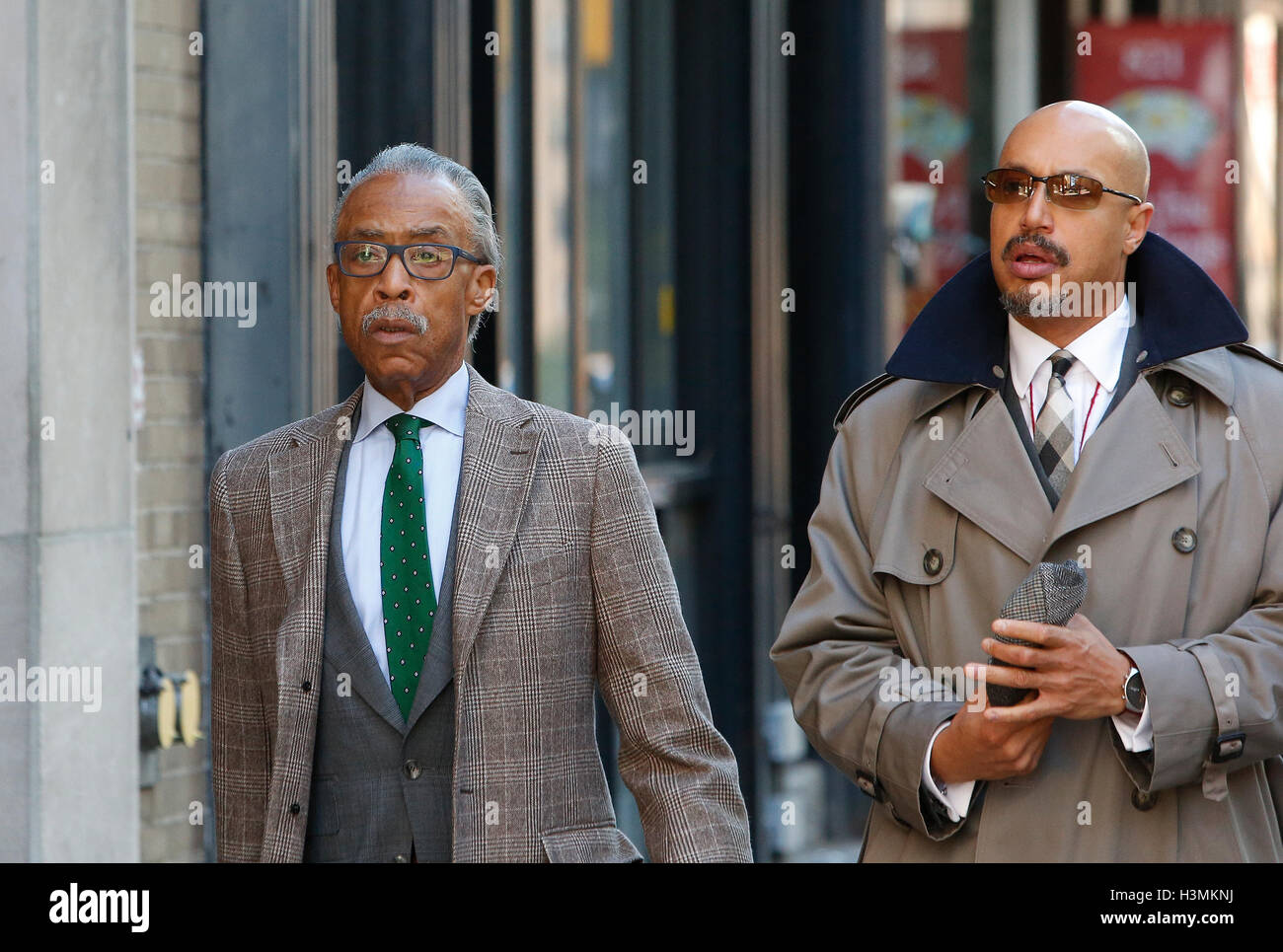 New York City, United States. 10th Oct, 2016. NAN director Rev Al Sharpton (rt) arrives at presser with Rev Kirstin Jon Foy. Rev Al Sharpton gathered with members of the NYC City Council in Midtown Manhattan to announce support for Haitians displaced by Hurricane Matthew, & to eulogize late Kings County district attorney Ken Thompson who passed away unexpectedly from cancer the day before. Credit:  Andy Katz/Pacific Press/Alamy Live News Stock Photo