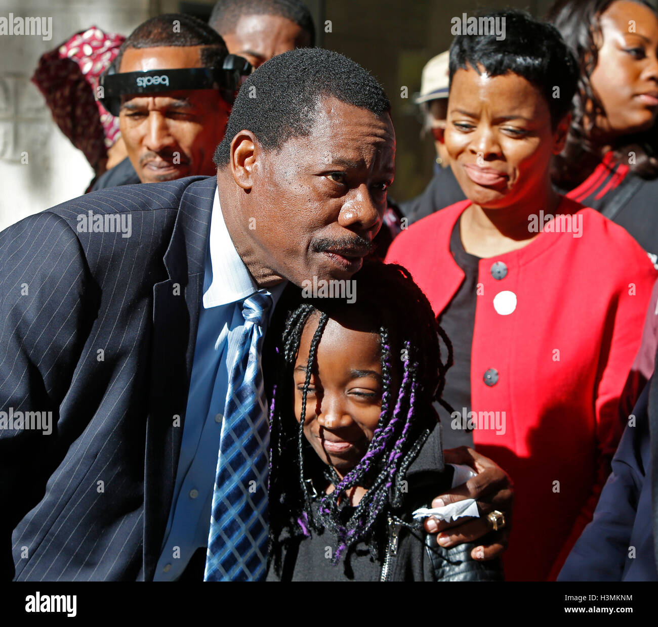 New York City, United States. 10th Oct, 2016. NY city council member Mathieu Eugene with young constituent. Rev Al Sharpton gathered with members of the NYC City Council in Midtown Manhattan to announce support for Haitians displaced by Hurricane Matthew, & to eulogize late Kings County district attorney Ken Thompson who passed away unexpectedly from cancer the day before. Credit:  Andy Katz/Pacific Press/Alamy Live News Stock Photo