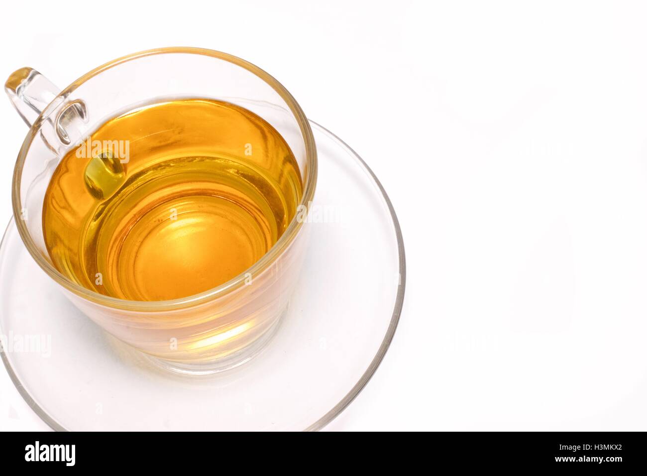 Glass cup of tea on white copy space Stock Photo