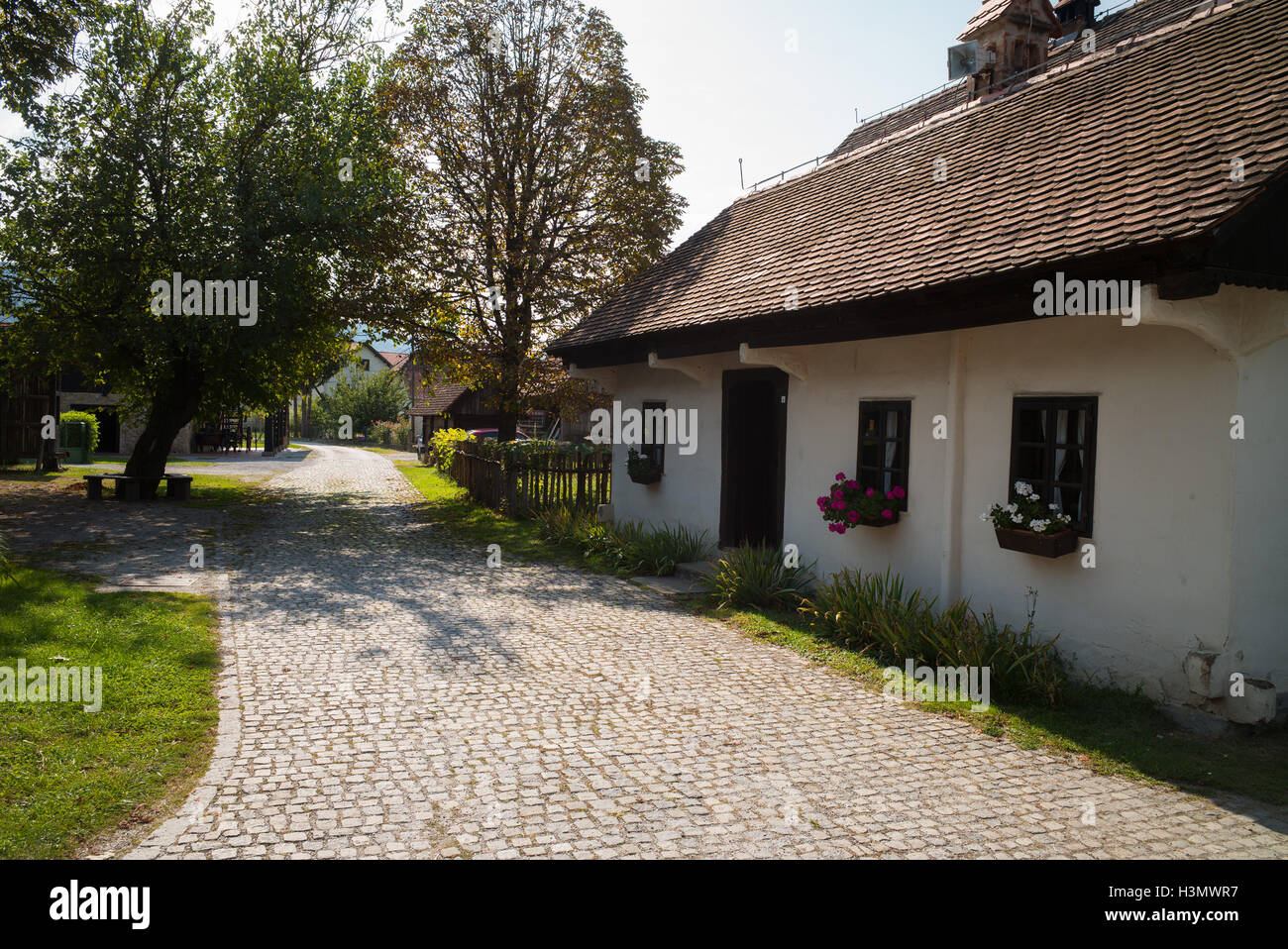 Cobbled lane and traditional house in Kumrovec, Croatia Stock Photo