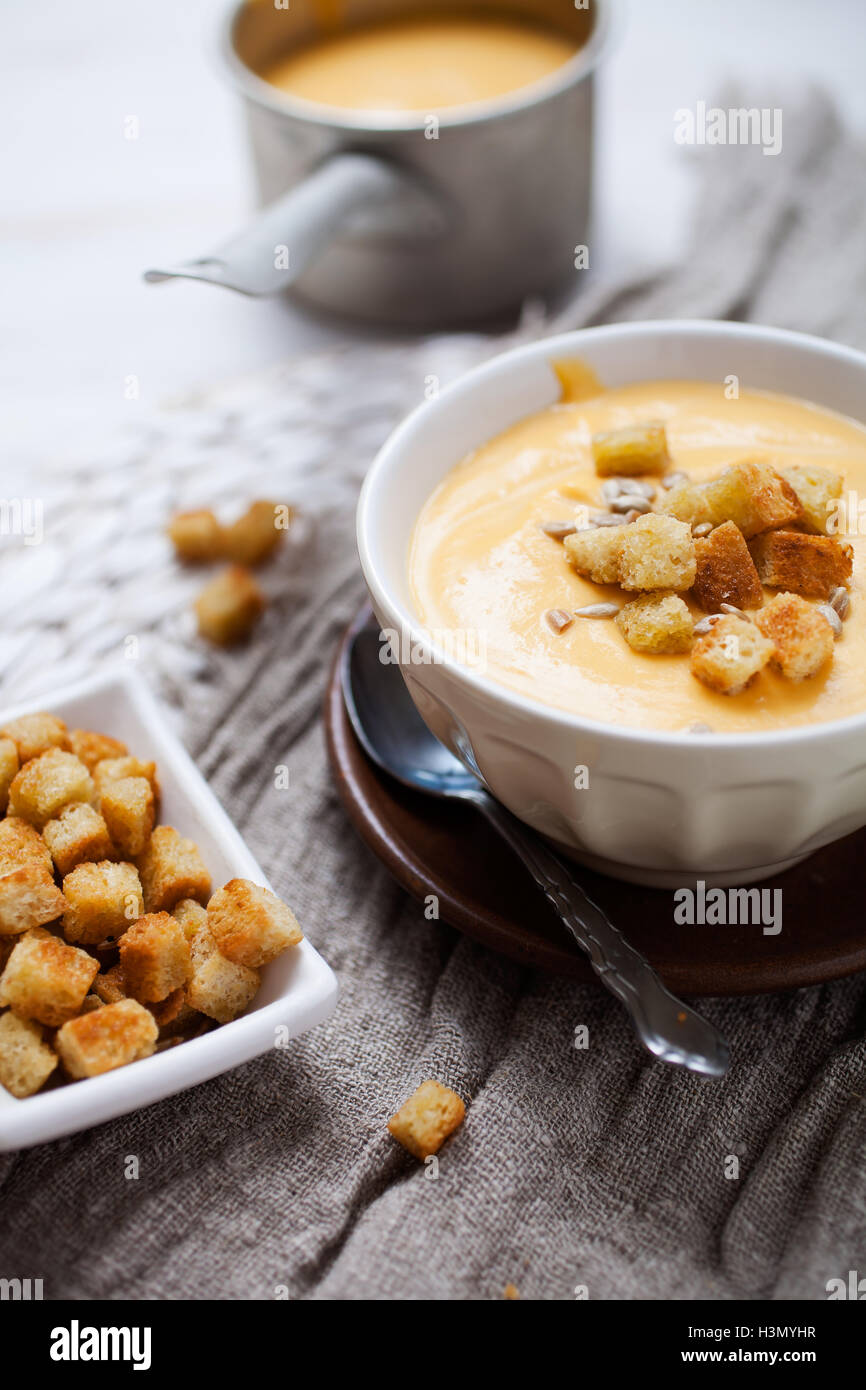 Soup with sweet potatoes, carrots and coconut Stock Photo