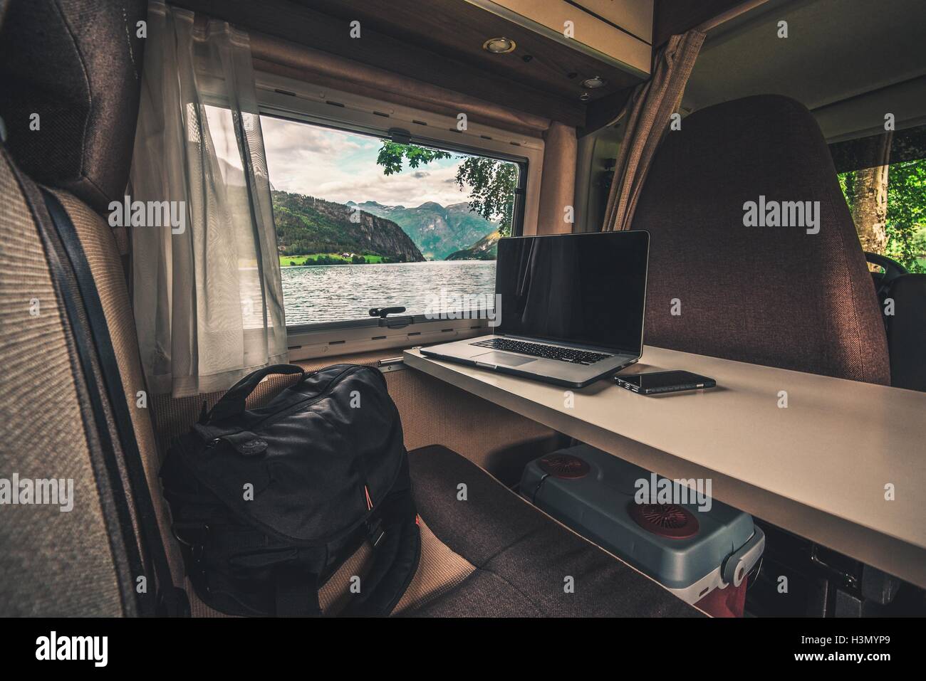 Work And Travel Concept Laptop Computer On The Motorhome Table