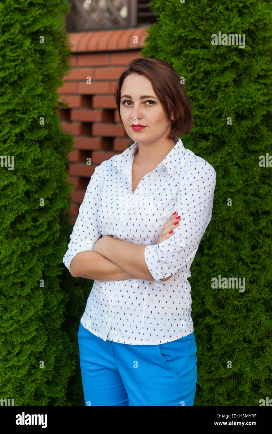 Girl with folded hands hi-res stock photography and images - Alamy