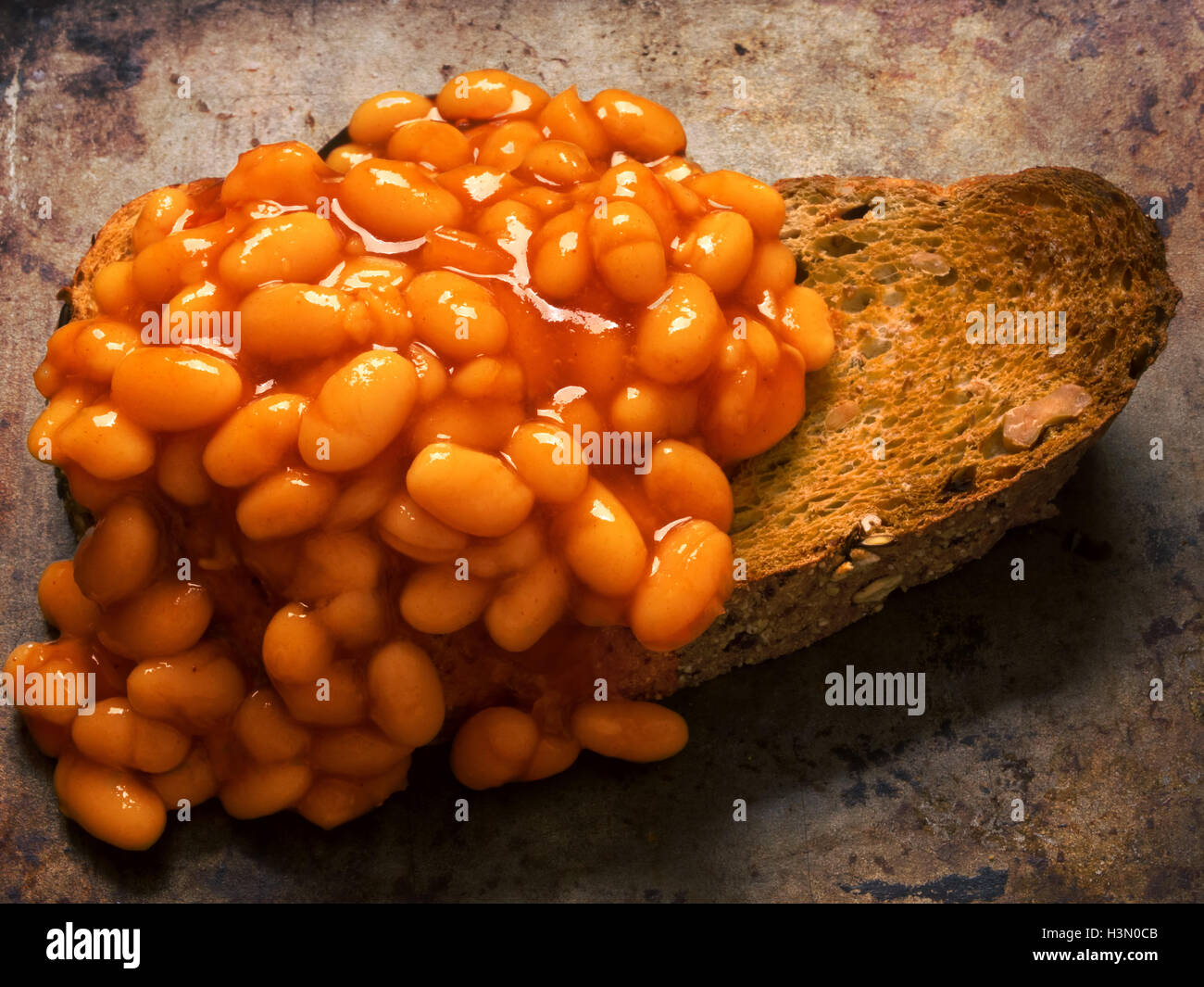 rustic british food baked beans on toast Stock Photo Alamy
