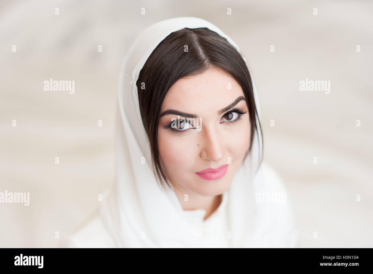 portrait of beautiful girl in white headscarf Stock Photo Alamy