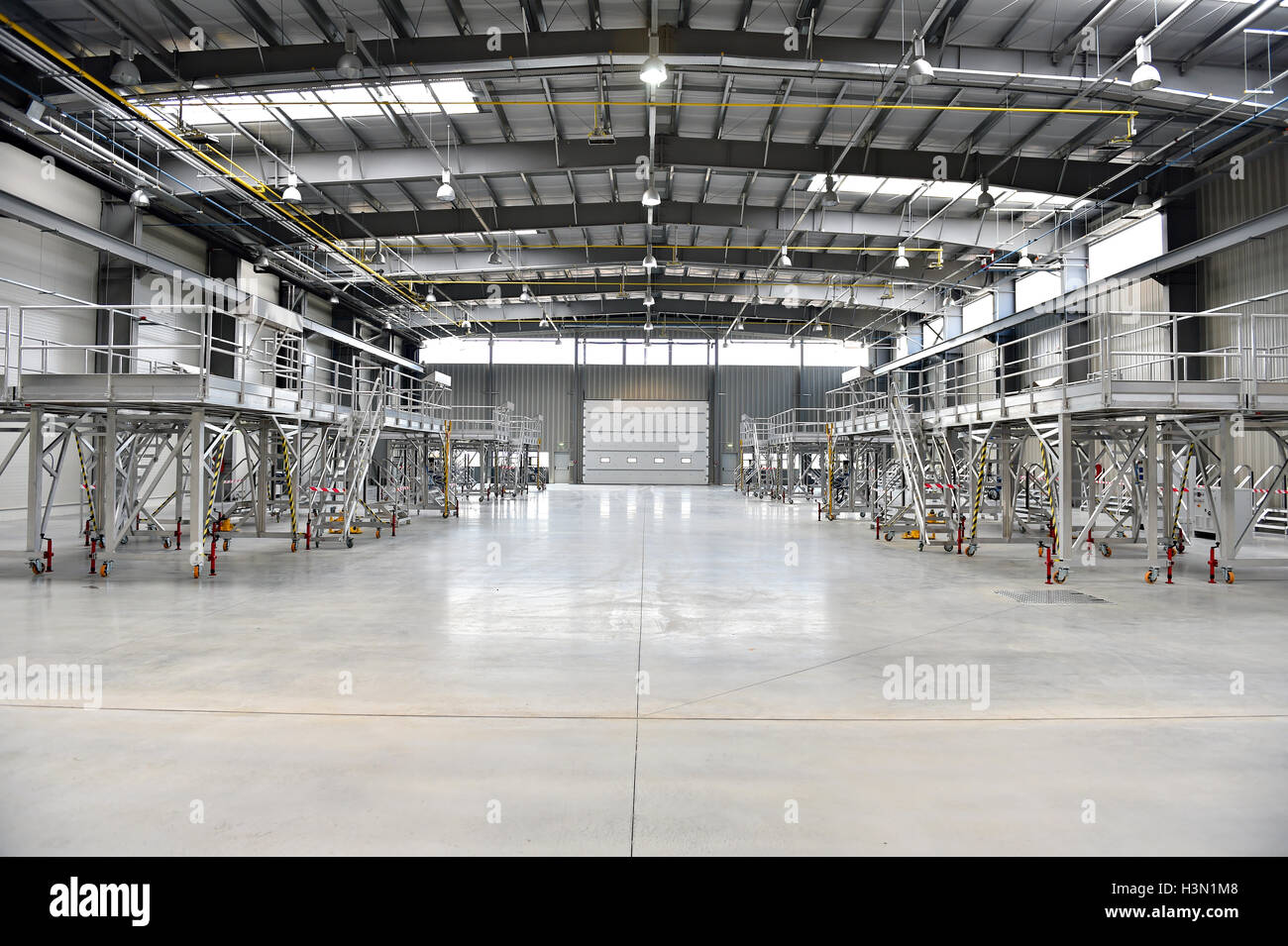 Interior shot with an empty new industrial warehouse Stock Photo