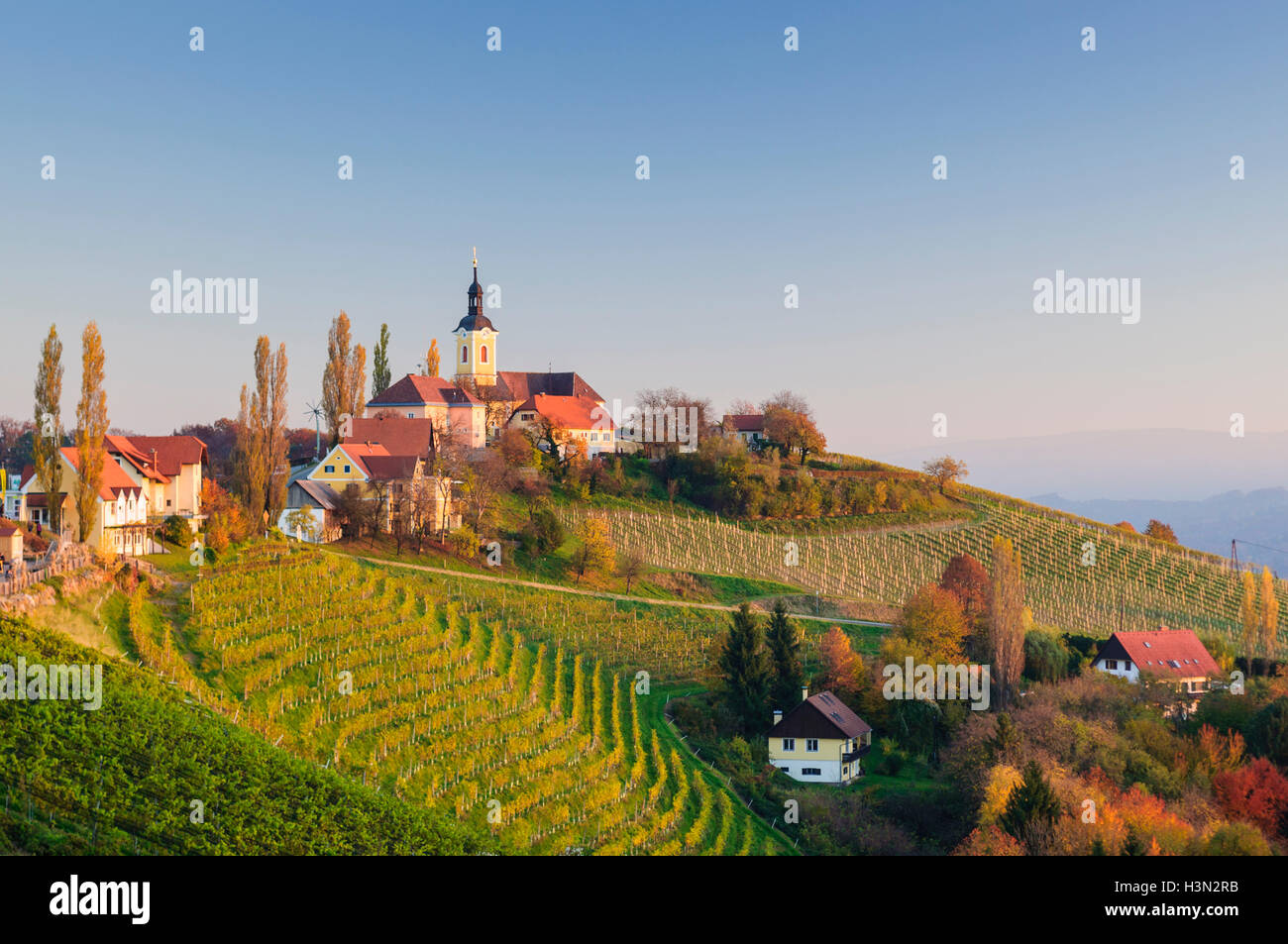 Kitzeck im Sausal (Südsteirisches Weinland): church Painful Mary,  vineyards, village, last sunlight, Südwest-Steiermark, Steier Stock Photo