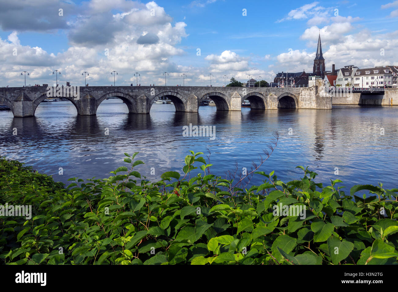 View of Maastricht city centre with its medieval bridge over the Meuse river. Maastricht a town in the Netherlands Stock Photo - Alamy