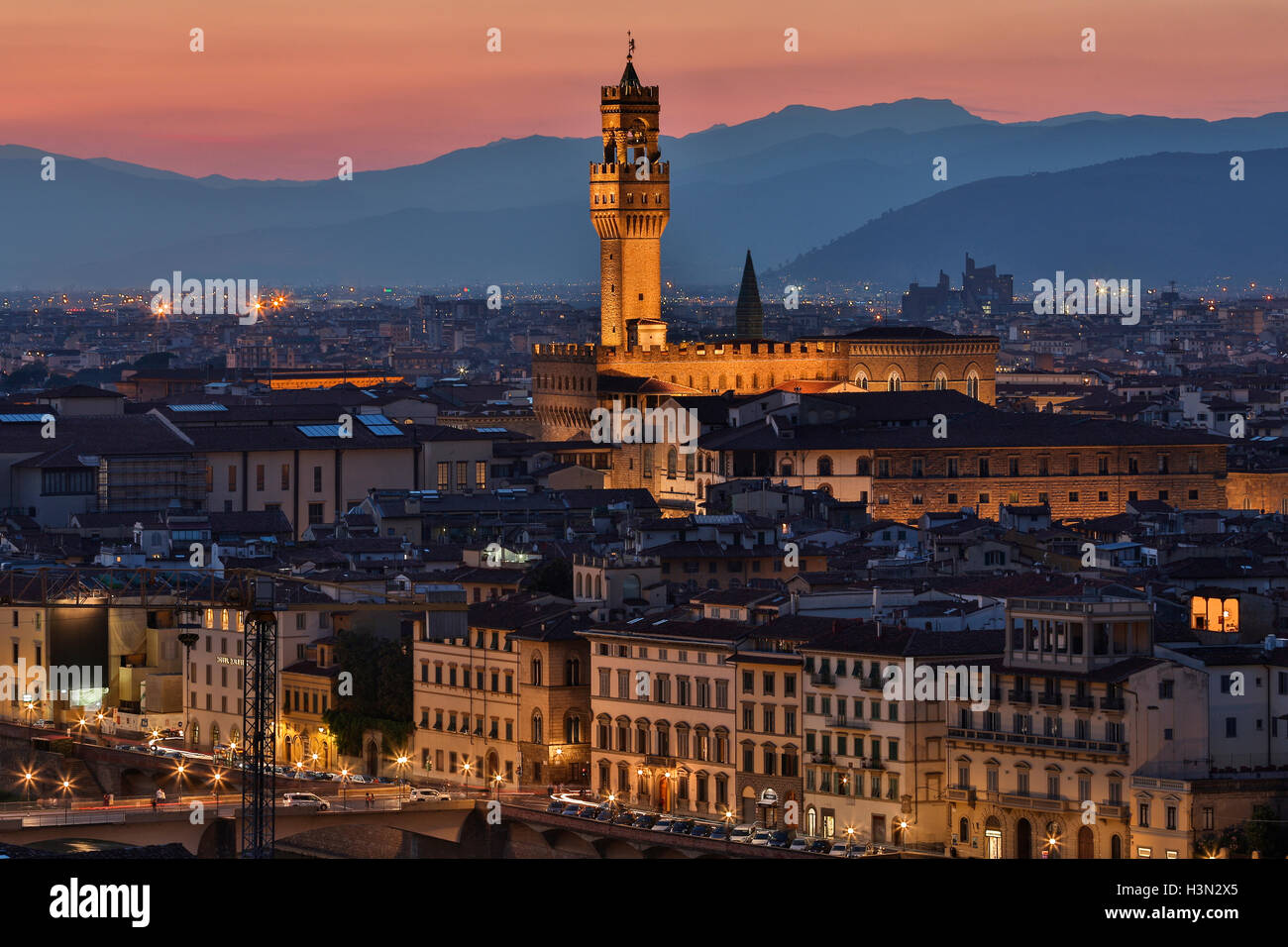 The Palazzo Vecchio and the city of Florence at night - viewed from Piazzale Michelangelo. Stock Photo