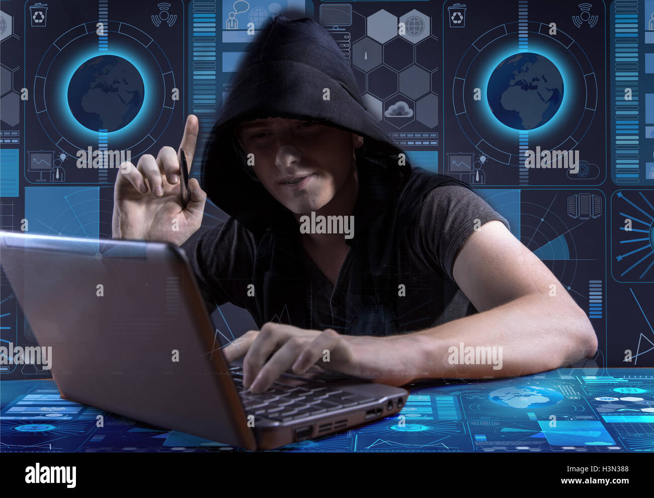 Young hacker in data security concept Stock Photo - Alamy