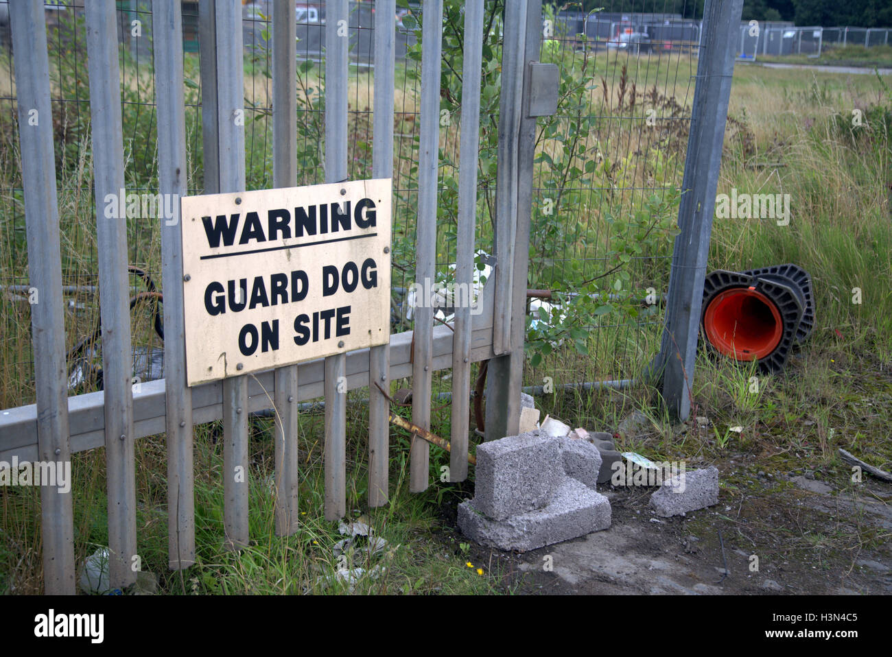warning guard dog on site private grounds warning  sign gate Stock Photo