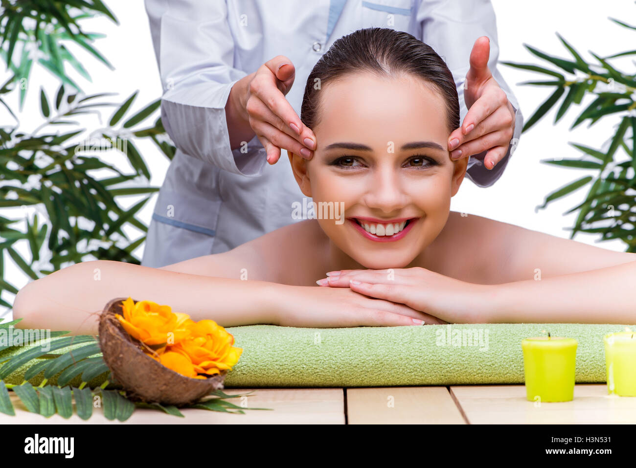 Woman during massage session in spa salon Stock Photo Alamy