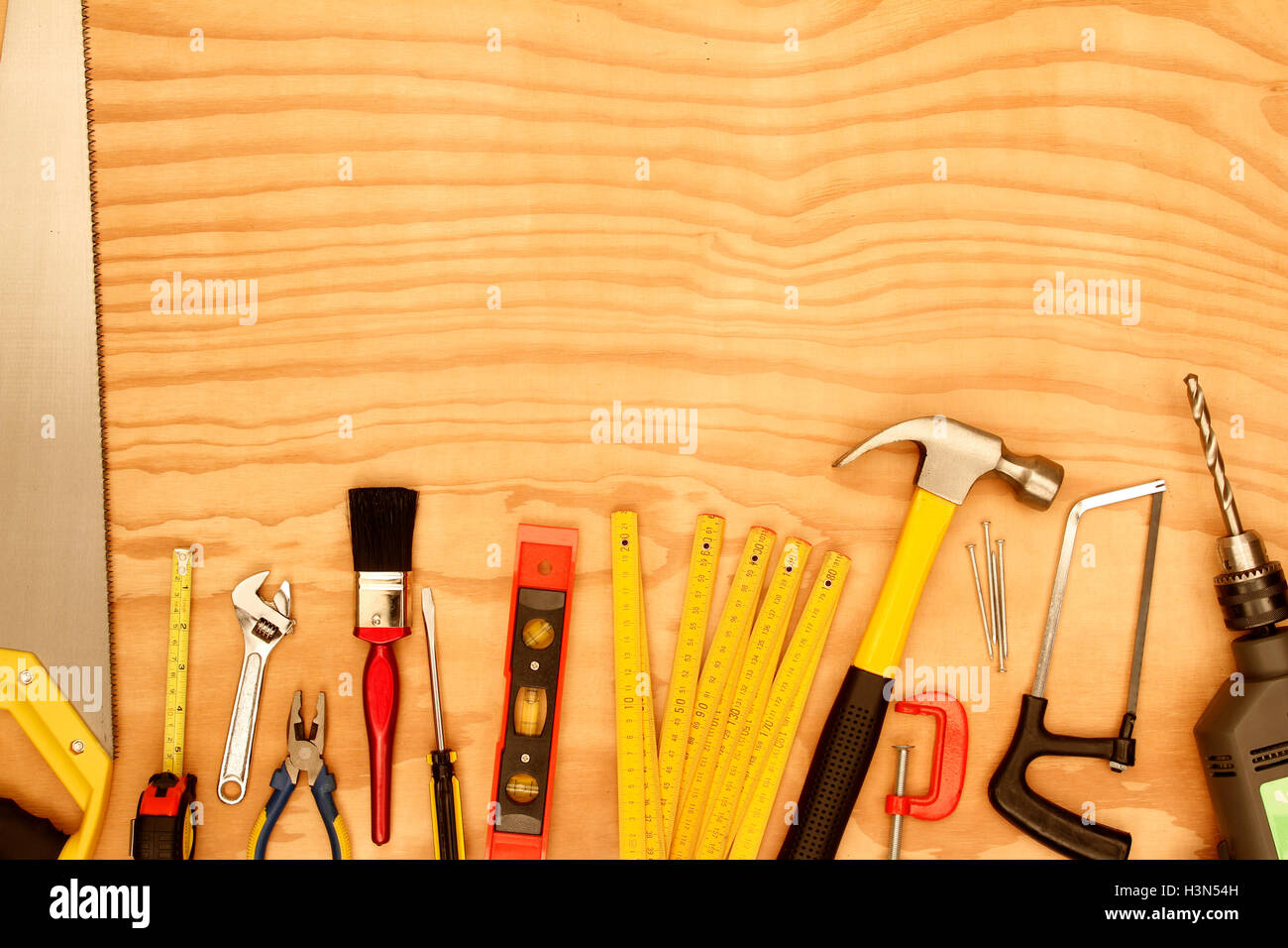 Assorted work tools on wood Stock Photo - Alamy