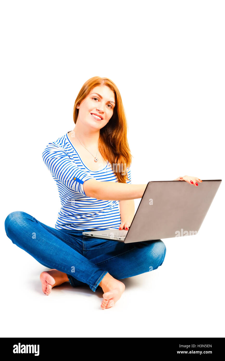 woman sitting in a lotus position on a white background with a l Stock ...