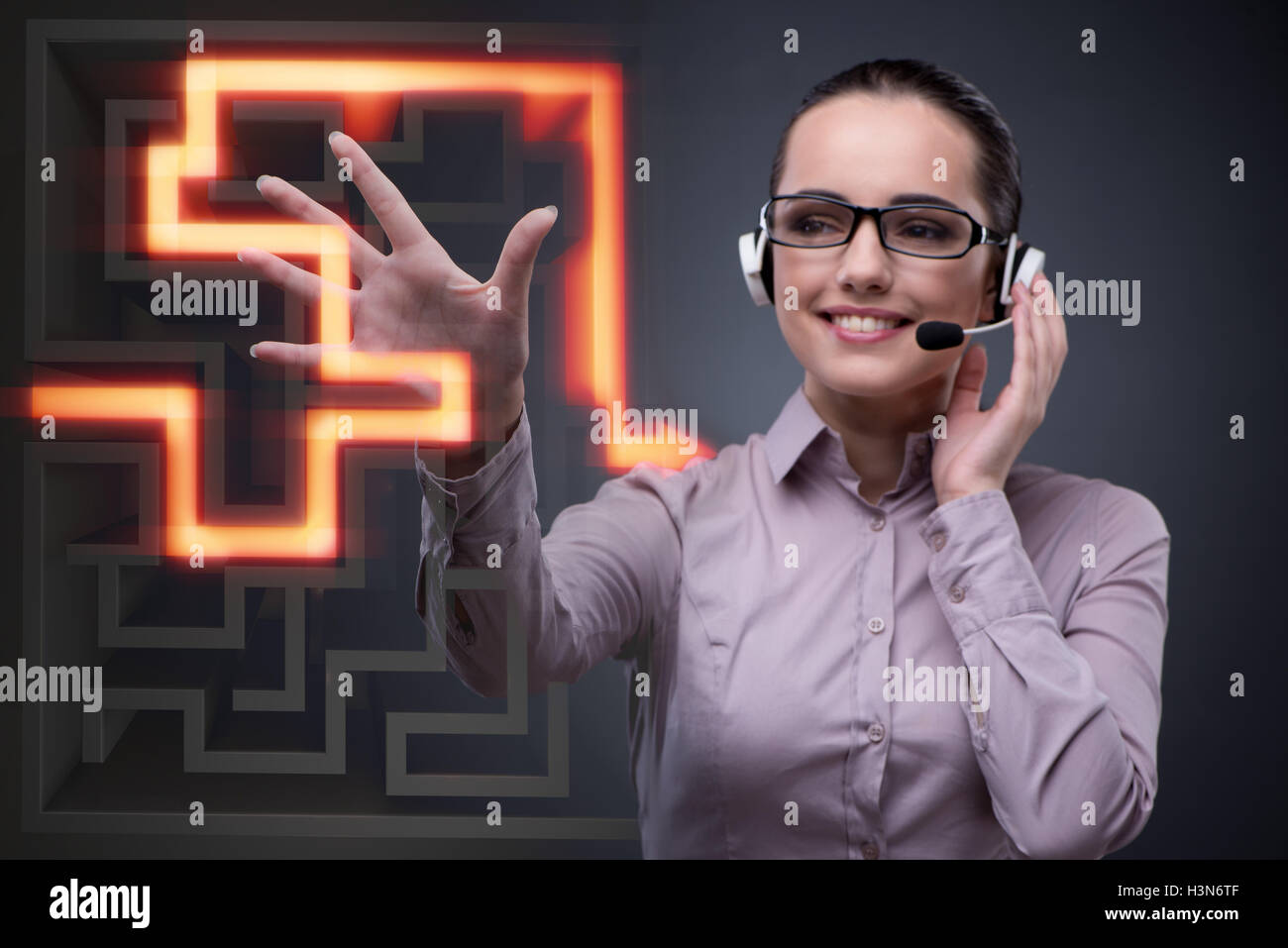 Businesswoman with maze in difficult situations concept Stock Photo - Alamy