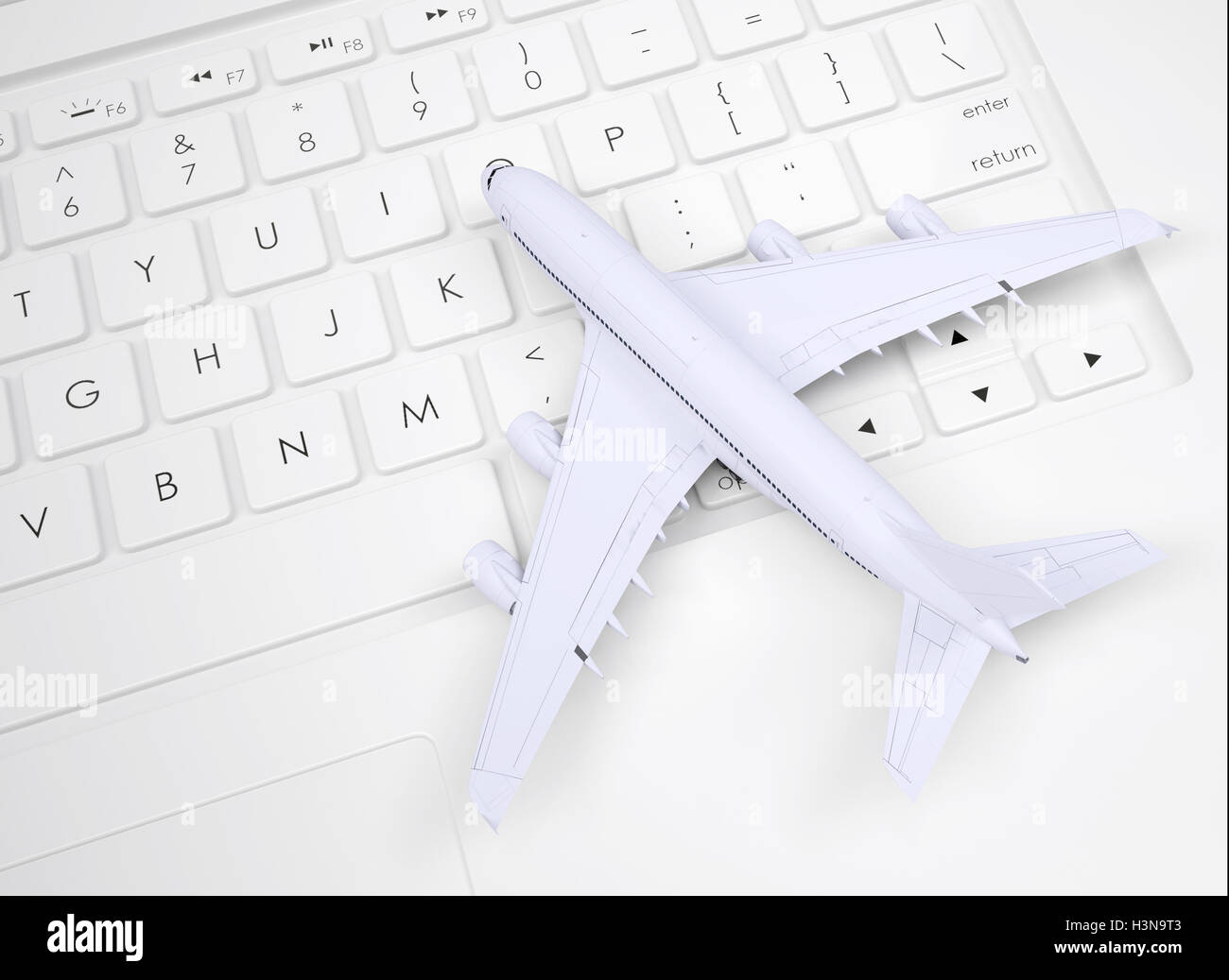 Airplane on the keyboard Stock Photo Alamy