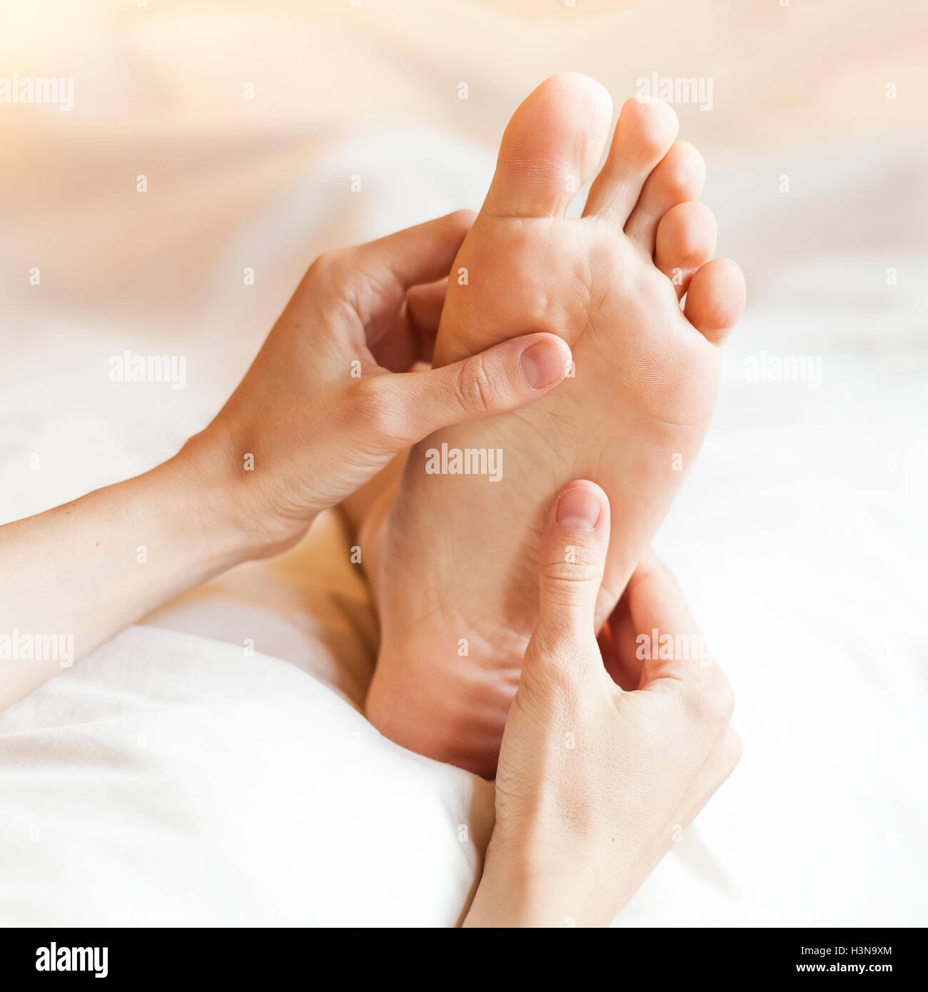 Thai foot massage with hands and thumbs Stock Photo Alamy