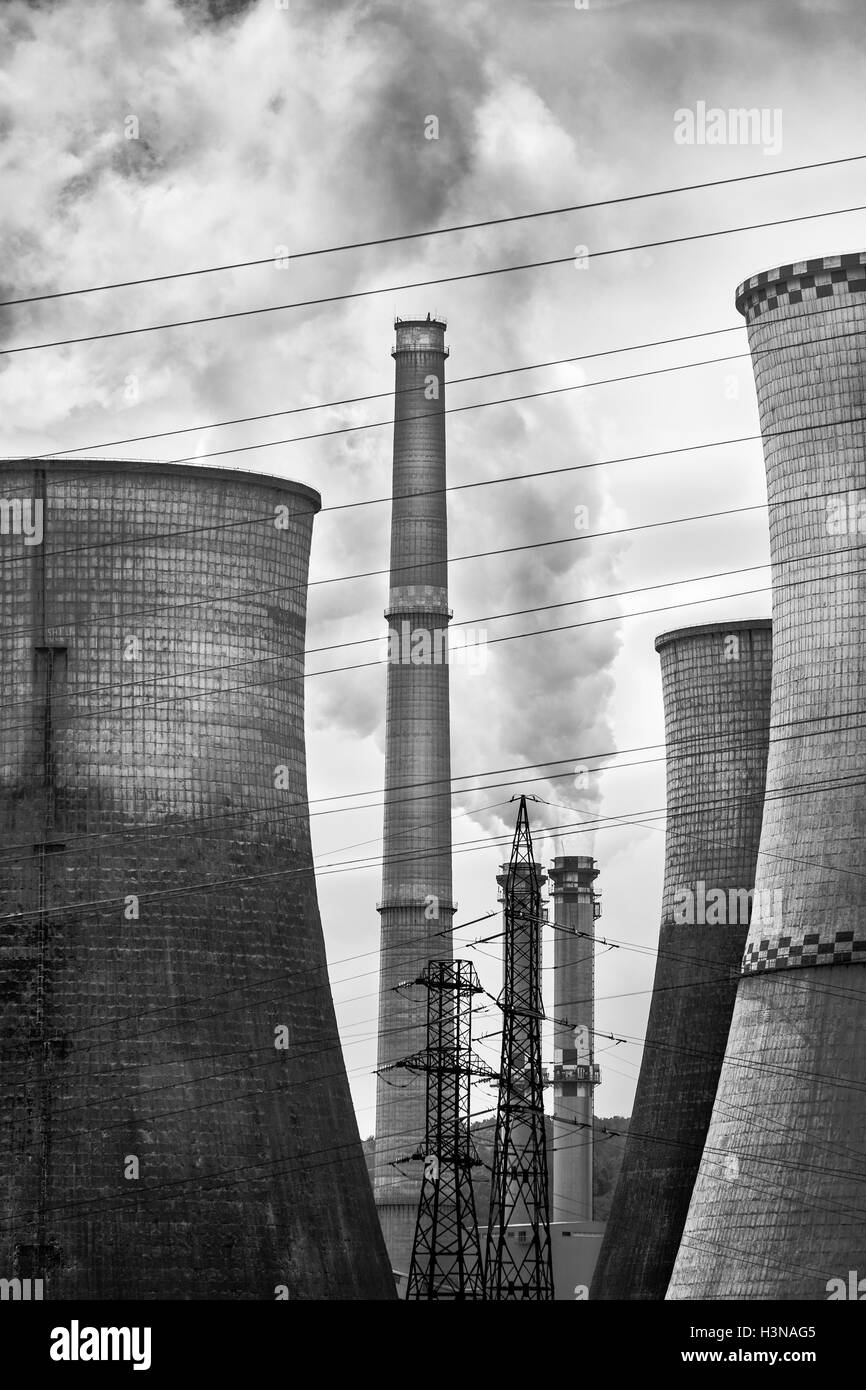 Coal Power plant with smoke and steam released in the atmosphere (pollution and global warming concept) Stock Photo