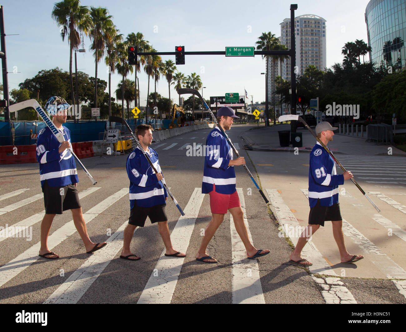 Tampa, Florida, USA. 8th Oct, 2016. DIRK SHADD | Times.Special section cover for the opening of the 2016-2017 Tampa Bay Lightning season. The Band is Back Together! Break out the vinyl with this Abbey Road Beatles album cover recreation. From left is Tampa Bay Lightning goalie Ben Bishop (30), center Tyler Johnson (9), defenseman Victor Hedman (77) and center Steven Stamkos (91). Instead of crossing Abbey Road in London, this fab four is crossing Channelside Drive with the Amalie Arena up ahead on right. © Dirk Shadd/Tampa Bay Times/ZUMA Wire/Alamy Live News Stock Photo