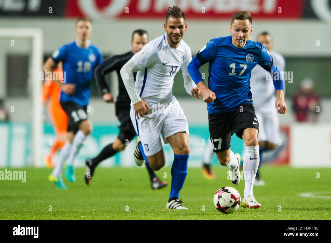 Tallinn, Estonia, 10th October 2016. Panagiotis Tachtsidis (L) of Greece fights for the ball with Siim Luts  (R) of Estonia during the FIFA World Cup 2018 qualifying match between Estonia and Greece Credit:  Nicolas Bouvy/Alamy Live News Stock Photo