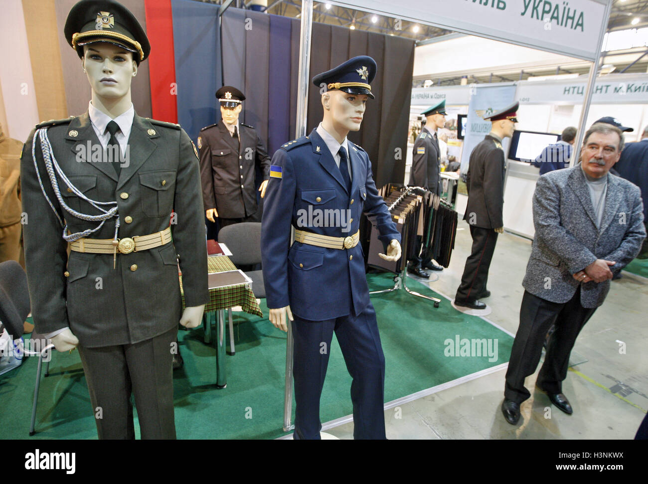 Kiev, Ukraine. 11th Oct, 2016. A visitor looks at mannequins dressed in