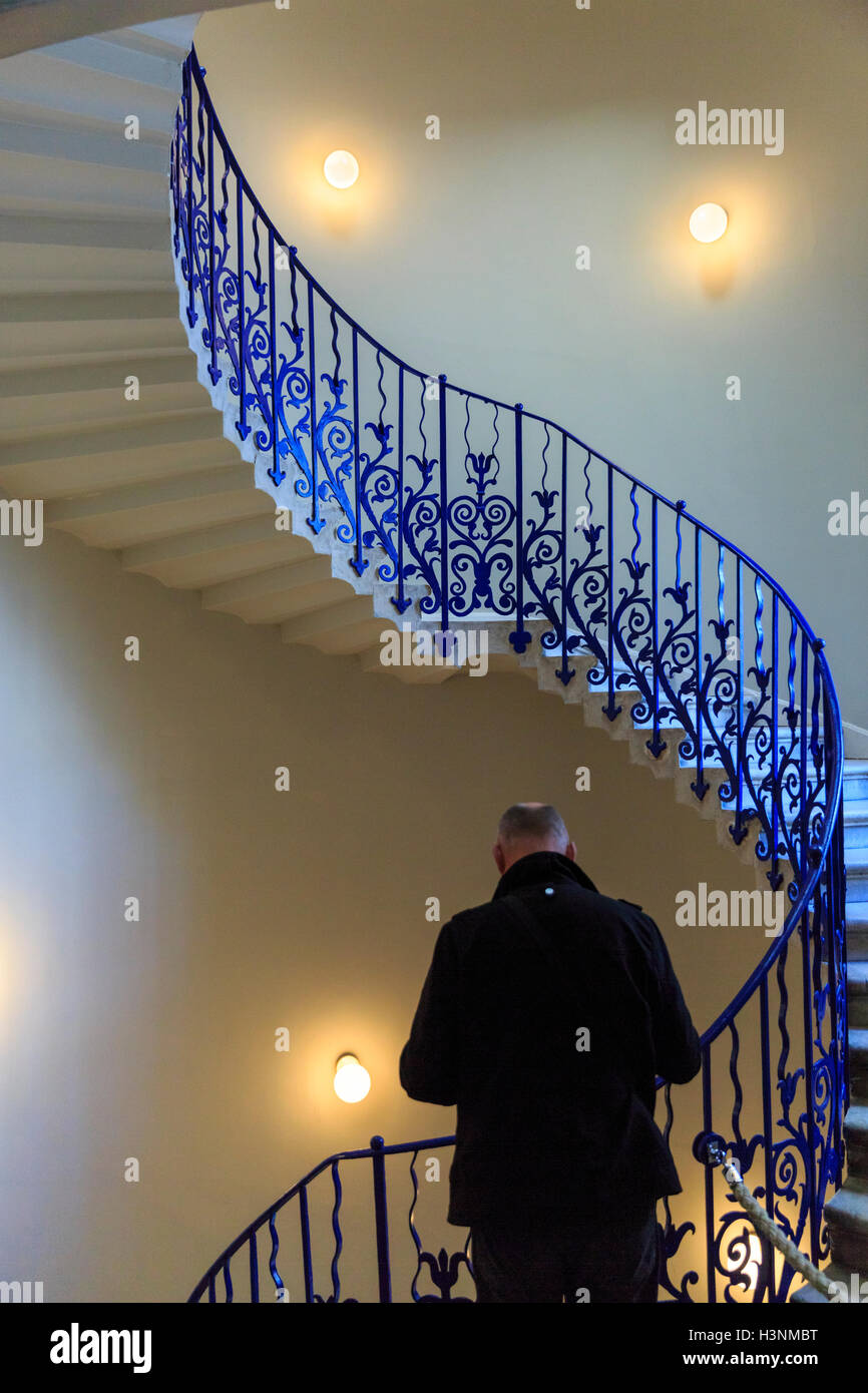 Royal Greenwich, London, 11th October 2016. A visitor explores the Tulip Stairs. The Queen's House, which was closed for restoration and refurbishment for over a year, re-opens to the public, marking the historic building's 400th anniversary. Credit:  Imageplotter News and Sports/Alamy Live News Stock Photo
