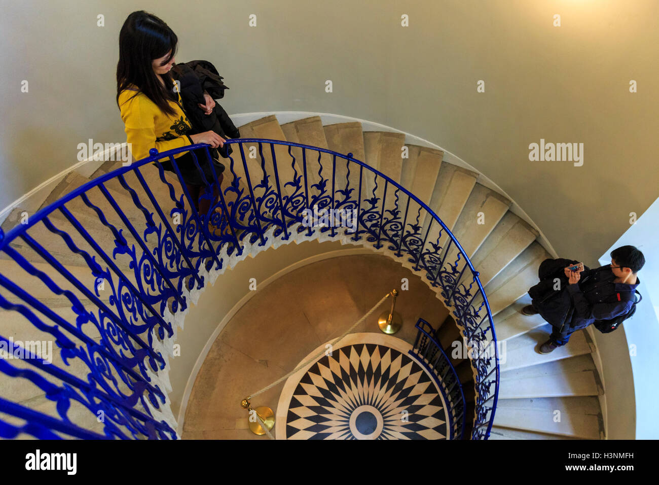 Royal Greenwich, London, 11th October 2016. Visitors explore the restored Tulip Stairs. The Queen's House, which was closed for restoration and refurbishment for over a year, re-opens to the public, marking the historic building's 400th anniversary. Credit:  Imageplotter News and Sports/Alamy Live News Stock Photo