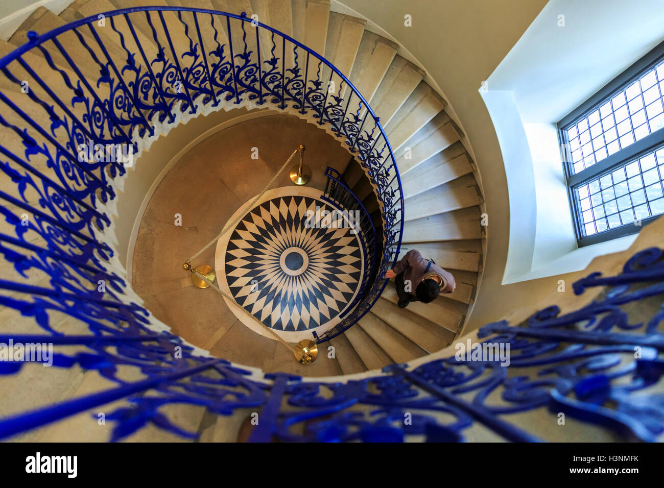 Royal Greenwich, London, 11th October 2016. Visitors explore the restored Tulip Stairs. The Queen's House, which was closed for restoration and refurbishment for over a year, re-opens to the public, marking the historic building's 400th anniversary. Credit:  Imageplotter News and Sports/Alamy Live News Stock Photo